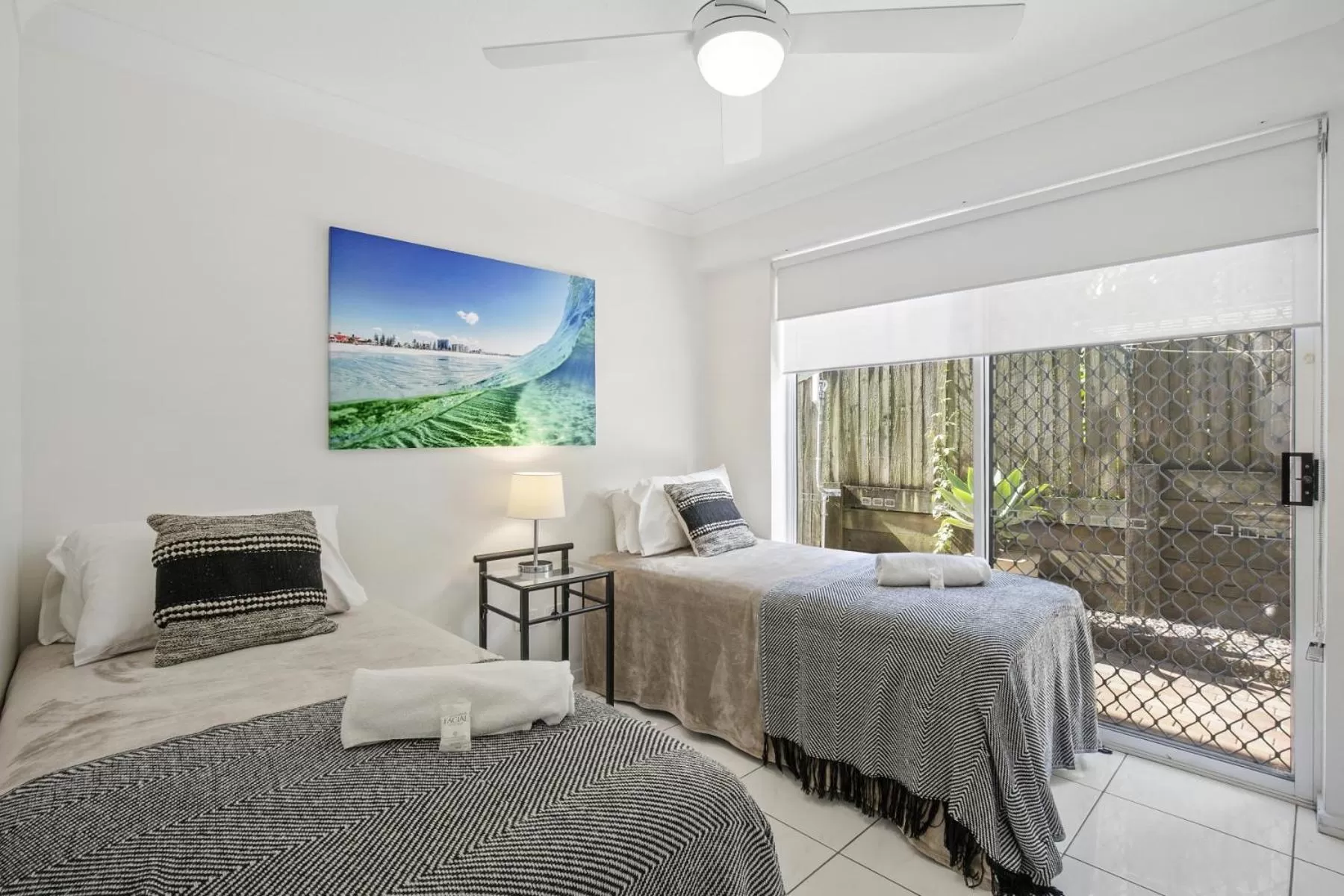 Bed in Kirra Palms Holiday Apartments