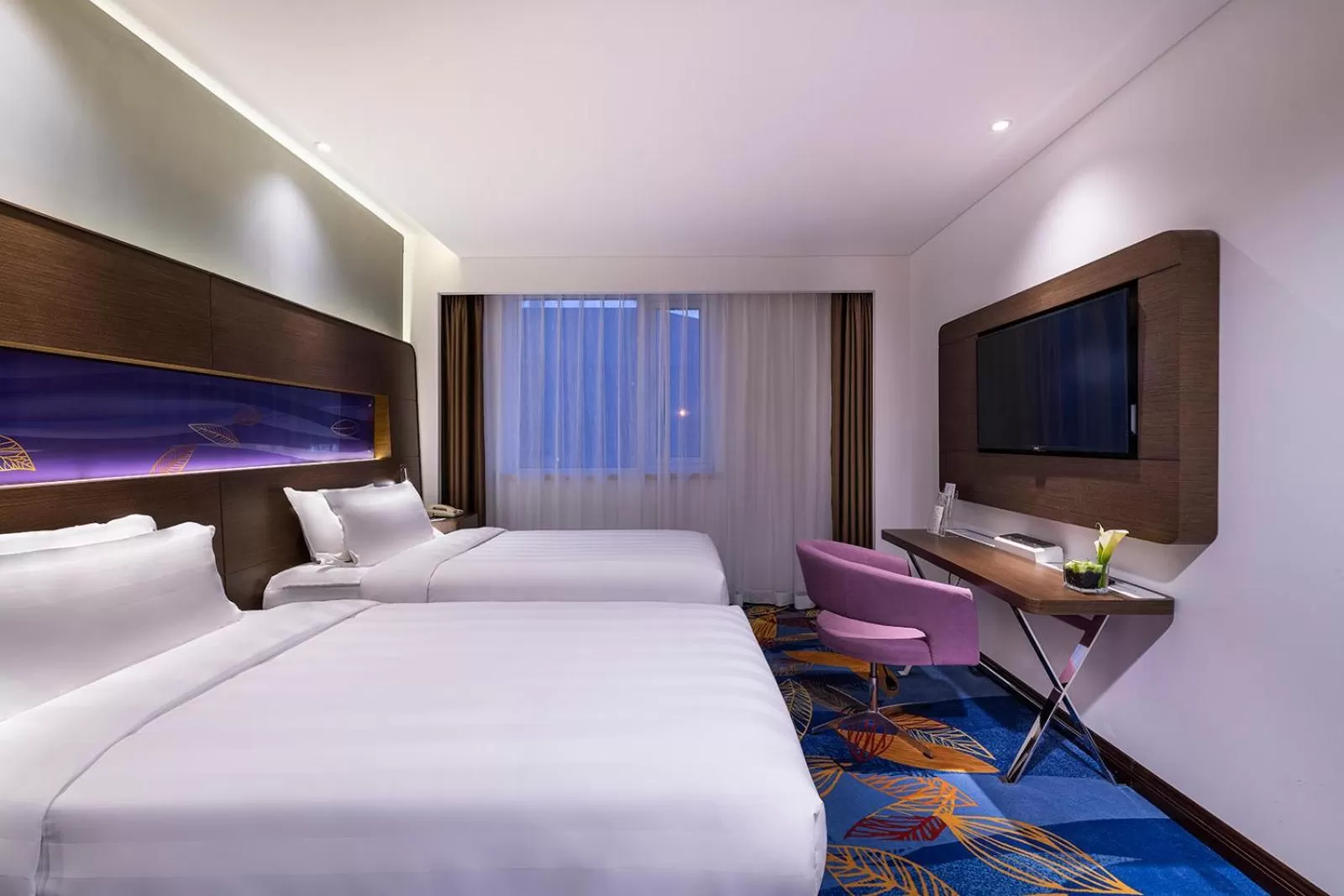 Communal lounge/ TV room, Bed in Novotel Beijing Peace