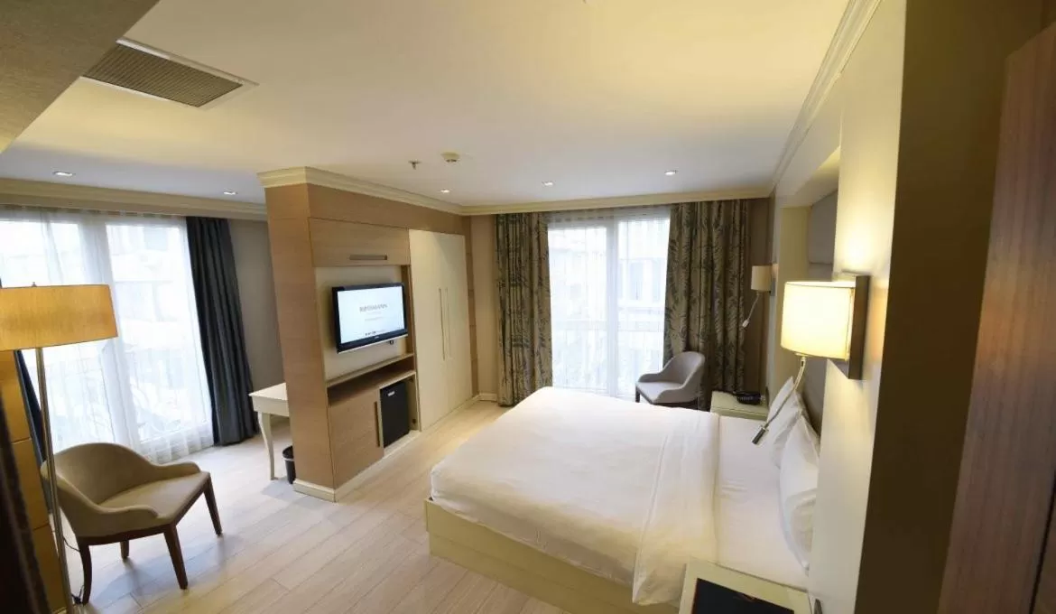 Bed in Hotel Le Mirage