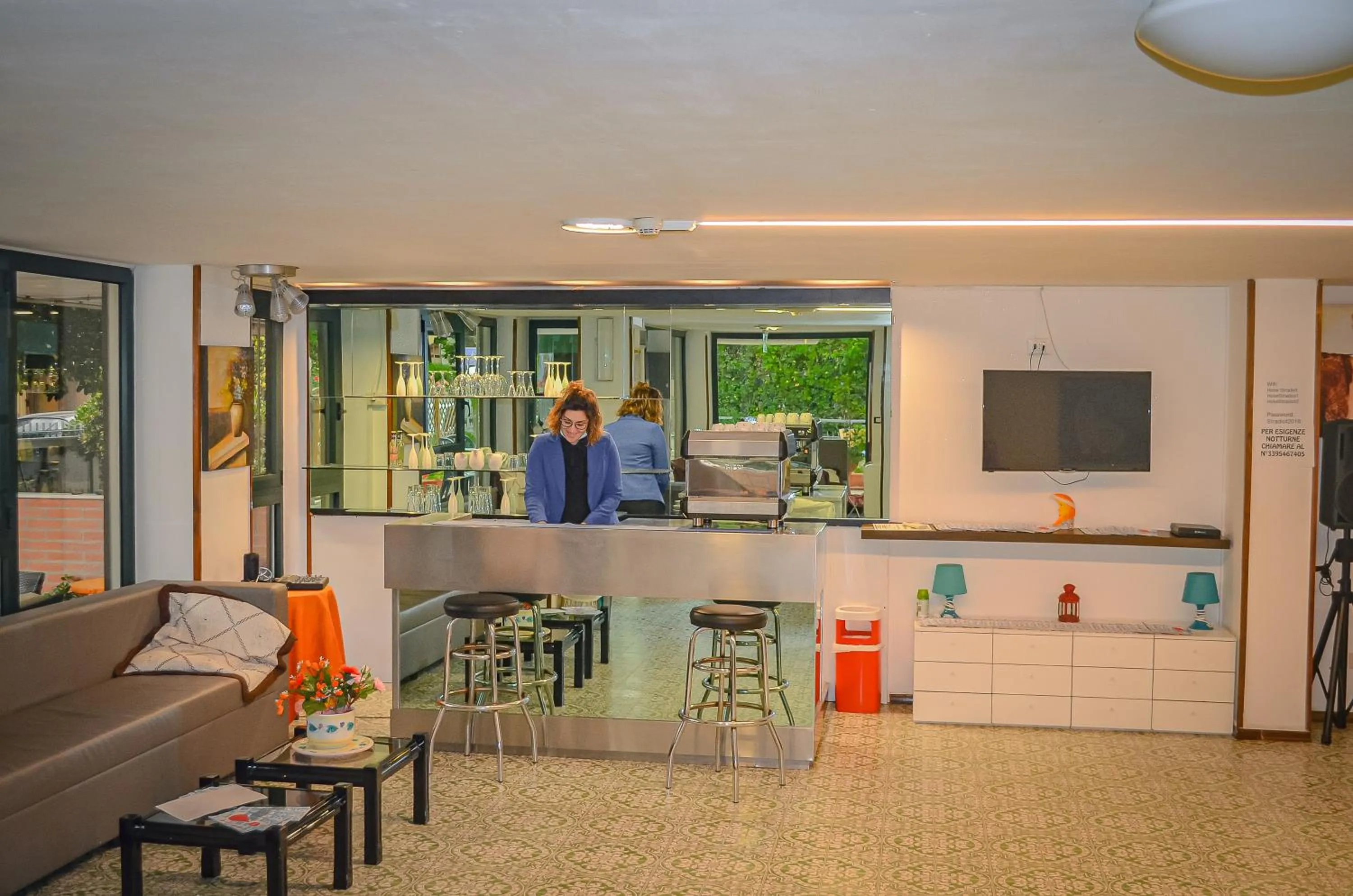 Communal lounge/ TV room in Hotel Stradiot