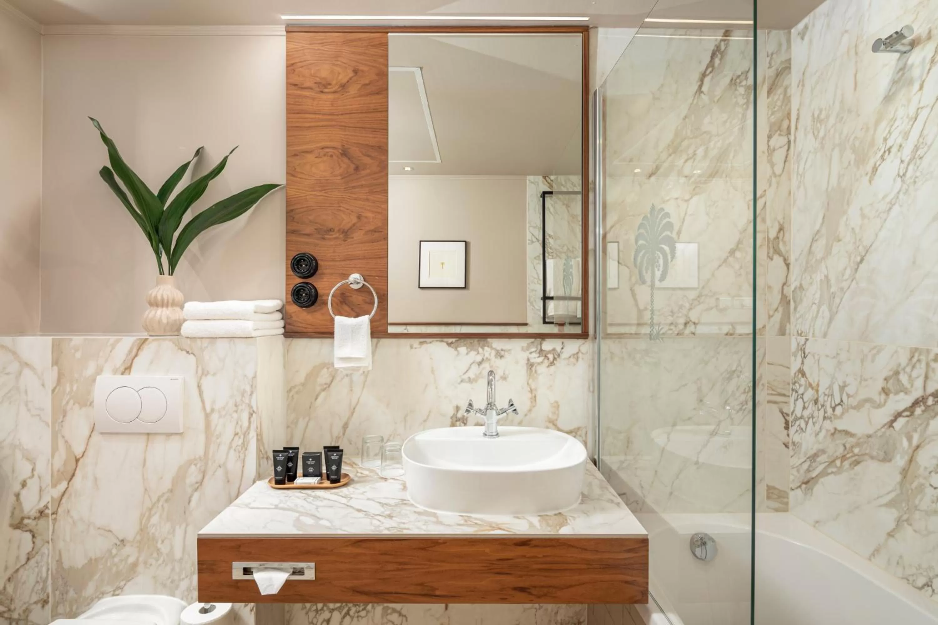 Bathroom in Queen's Court Hotel & Residence