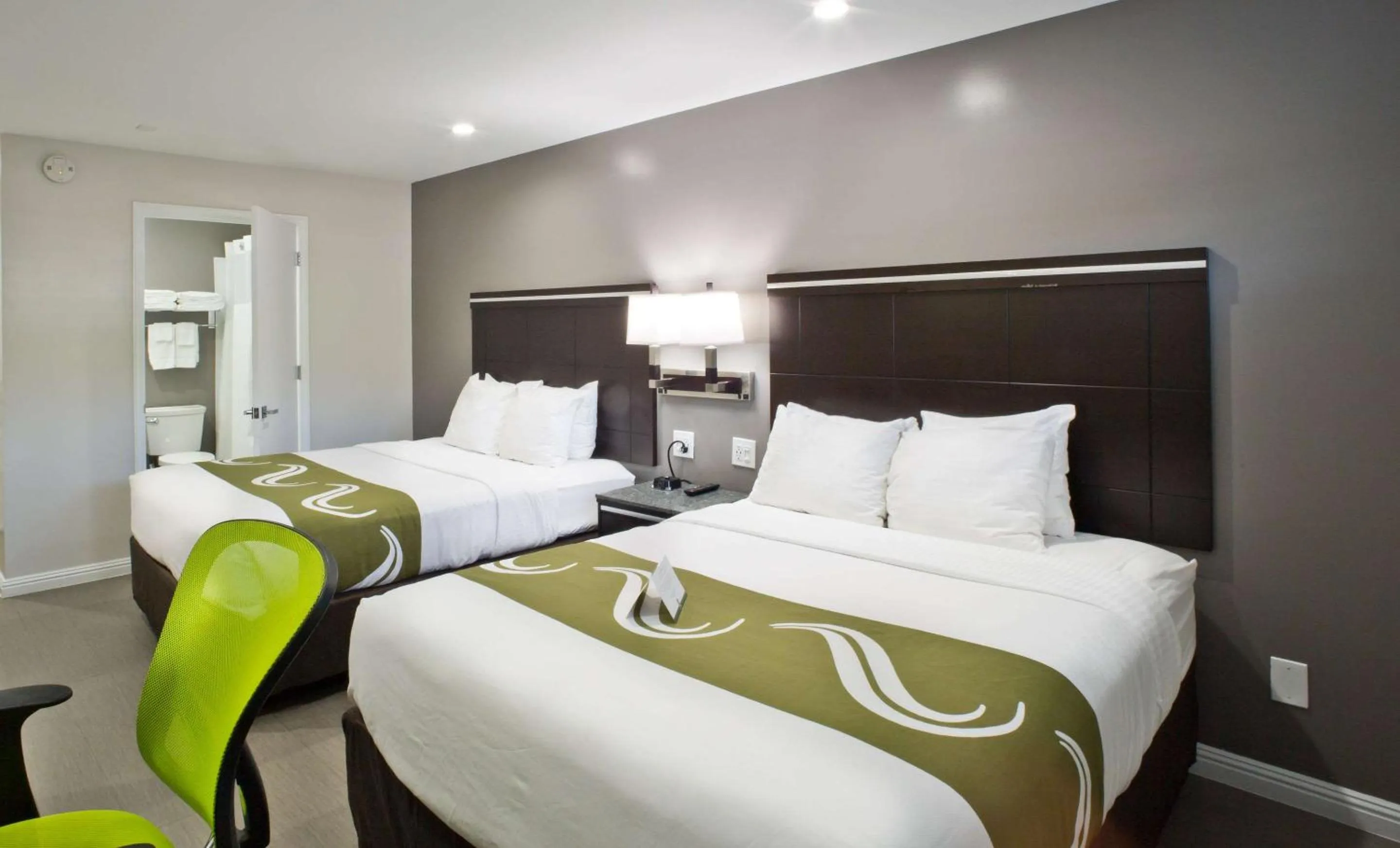 Photo of the whole room, Bed in Bay Area Inn & Suites