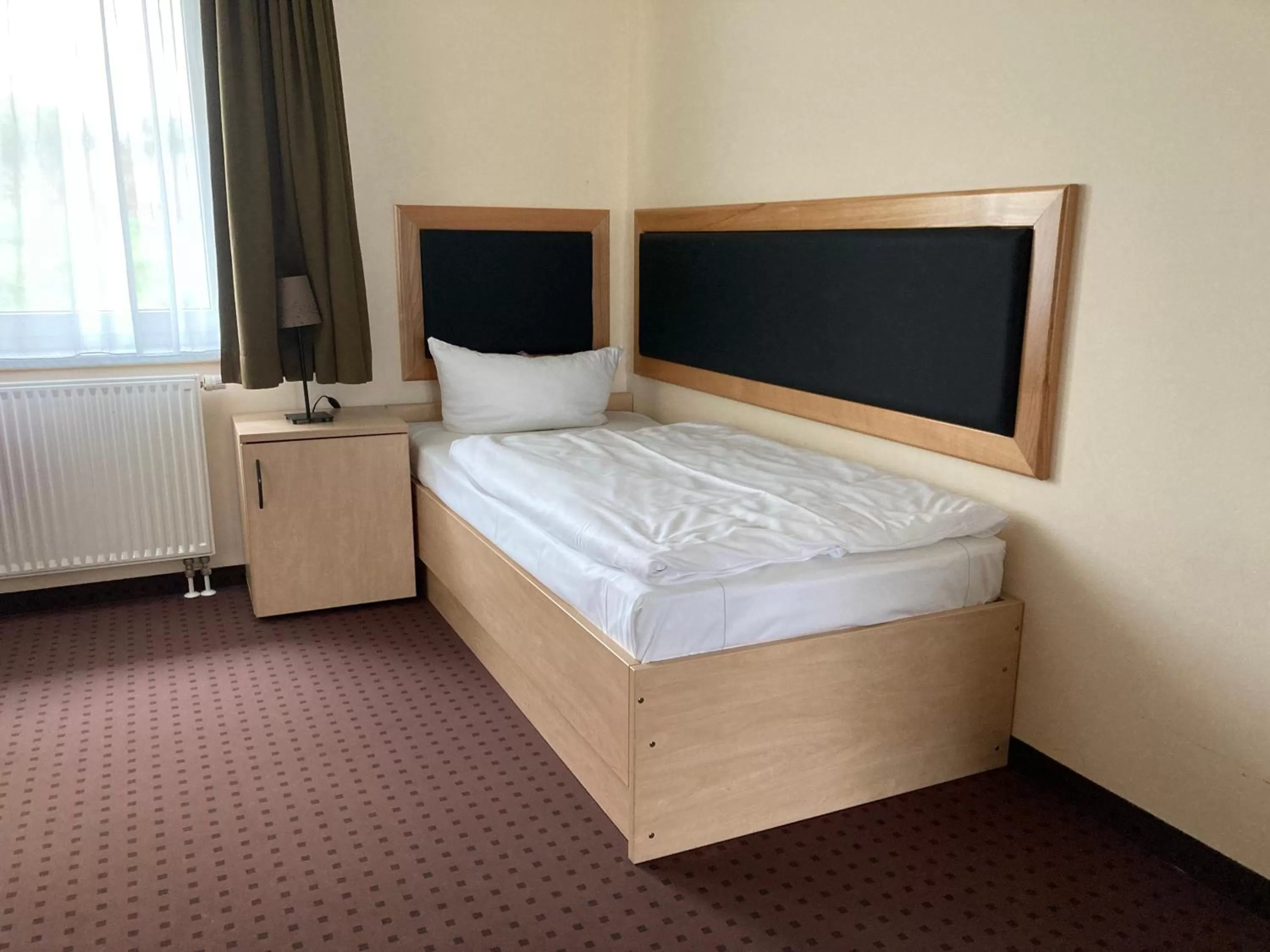 Bed in Hotel Am Heidepark