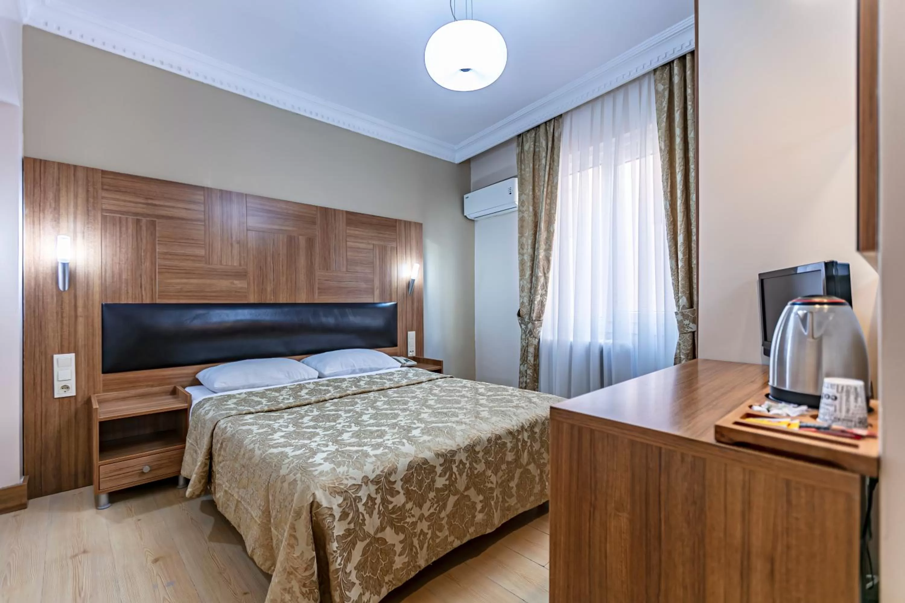 Bed in Elasophia Hotel