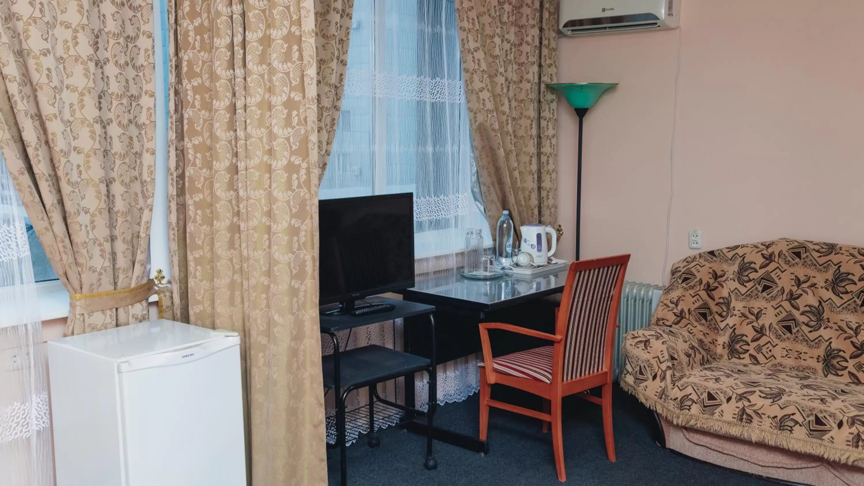 TV and multimedia, TV/Entertainment Center in Aktobe Hotel