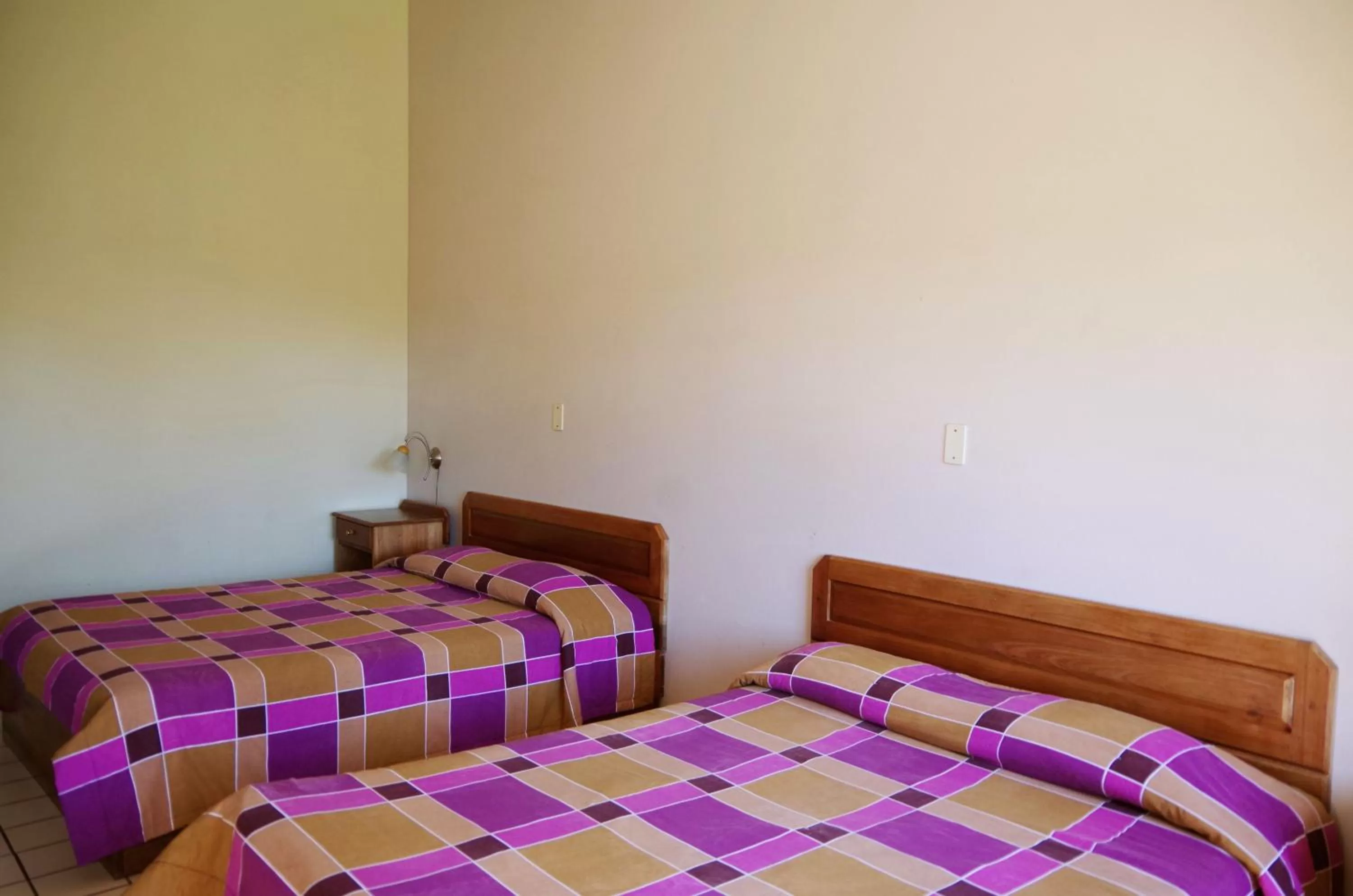 Bed in Hotel Villa Zurqui