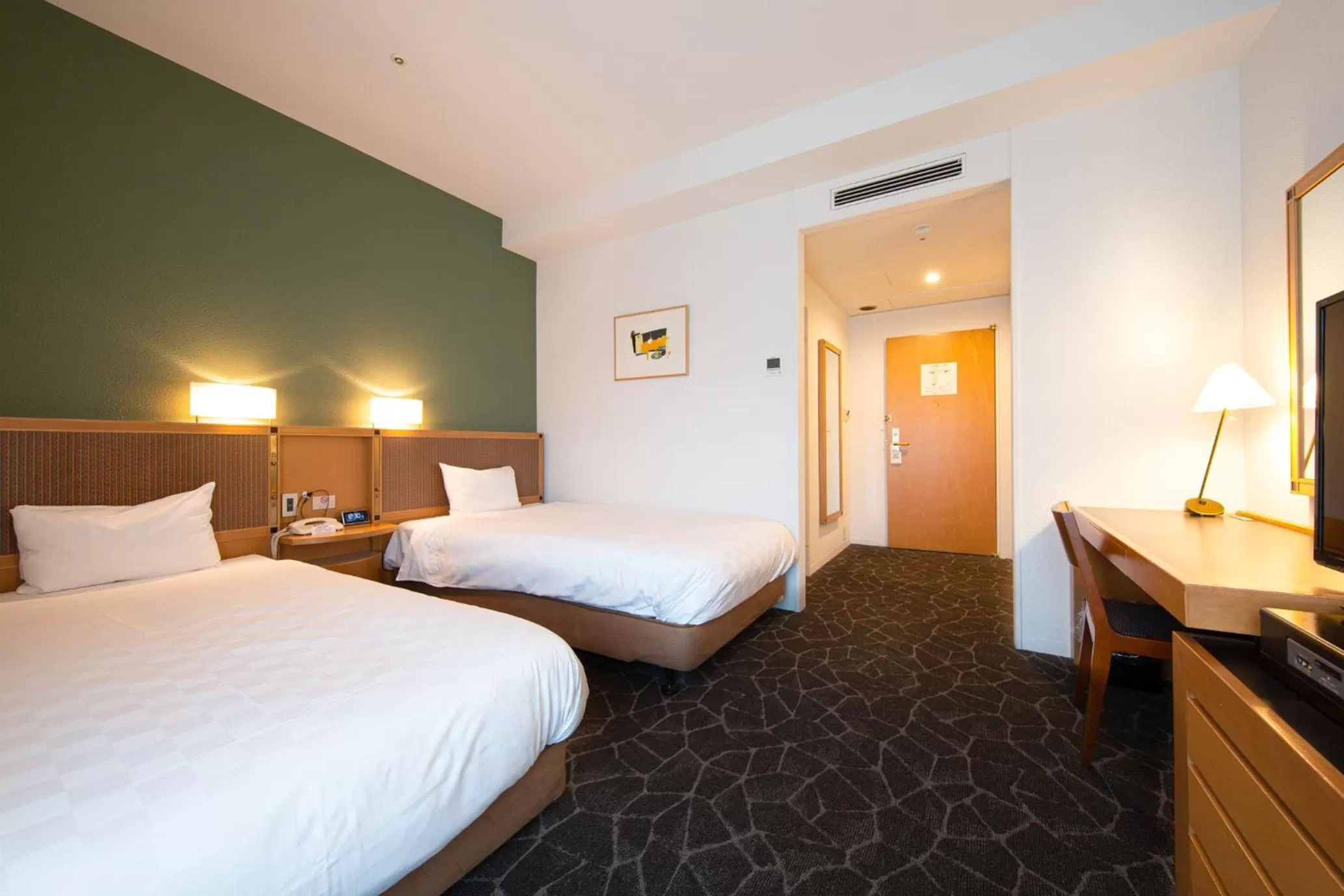 Bed in Hotel Nagoya Garden Palace