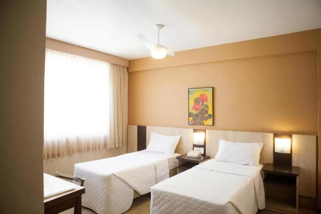 Bed in Hotel Palmeiras