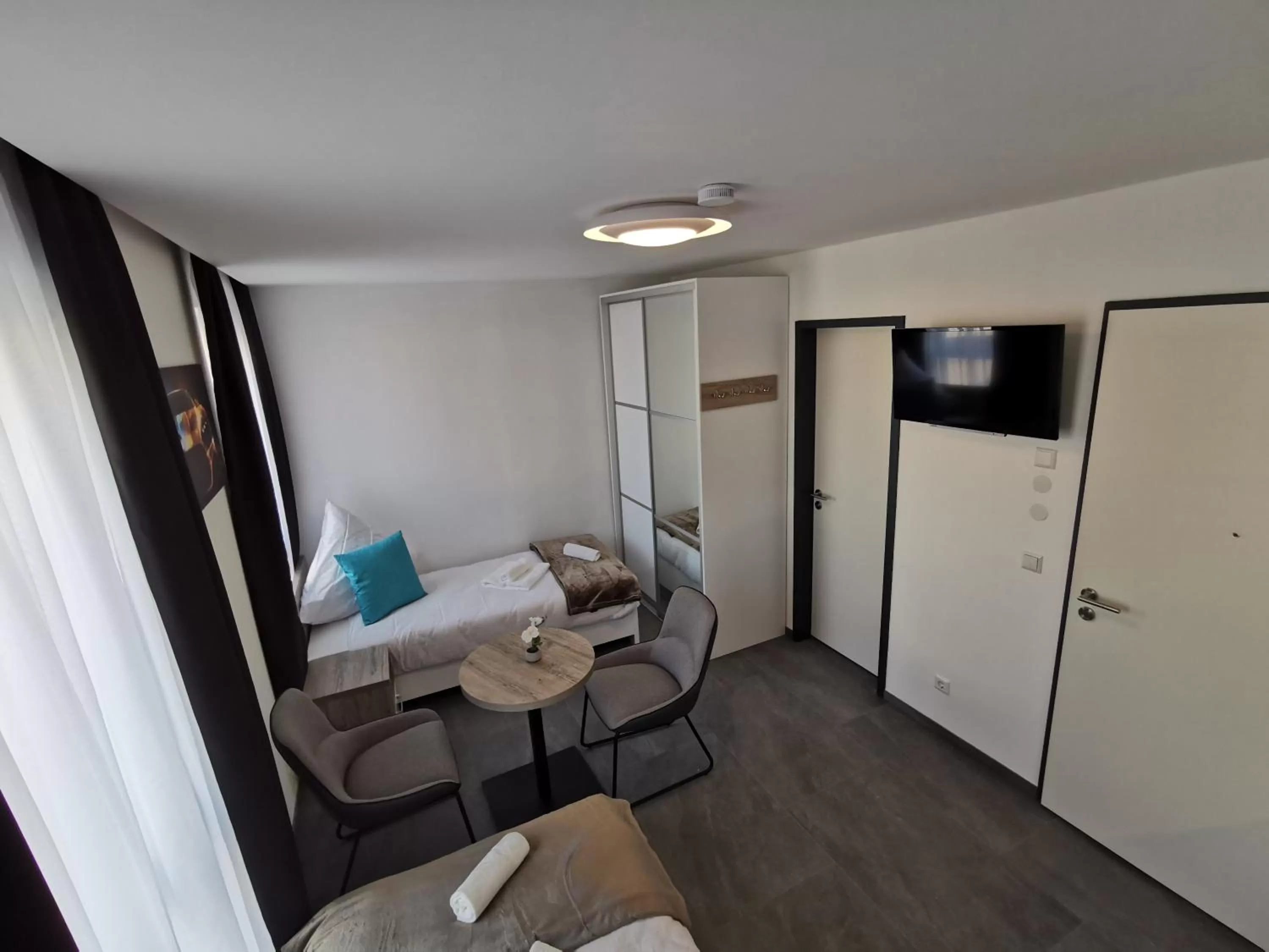 Communal lounge/ TV room in HP Apartments