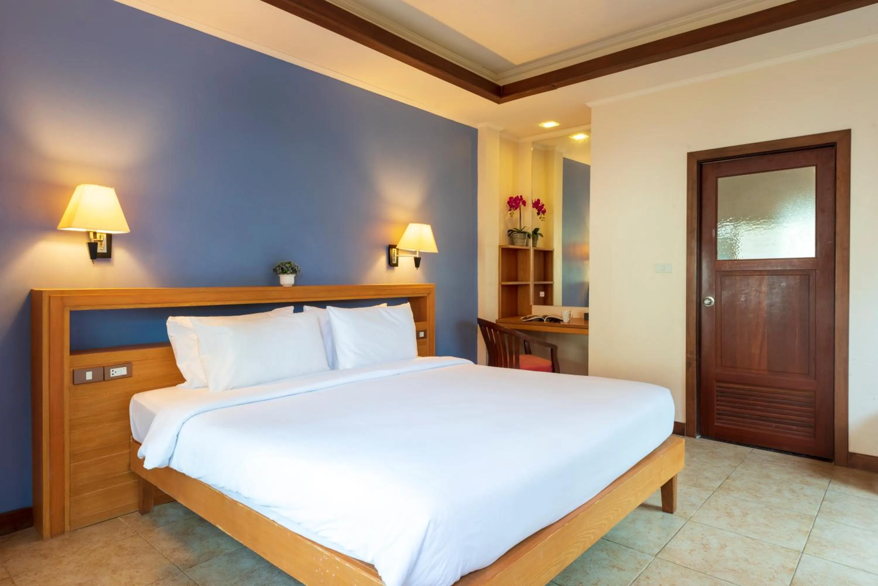 Bed in Pinnacle Grand Jomtien Resort and Beach Club