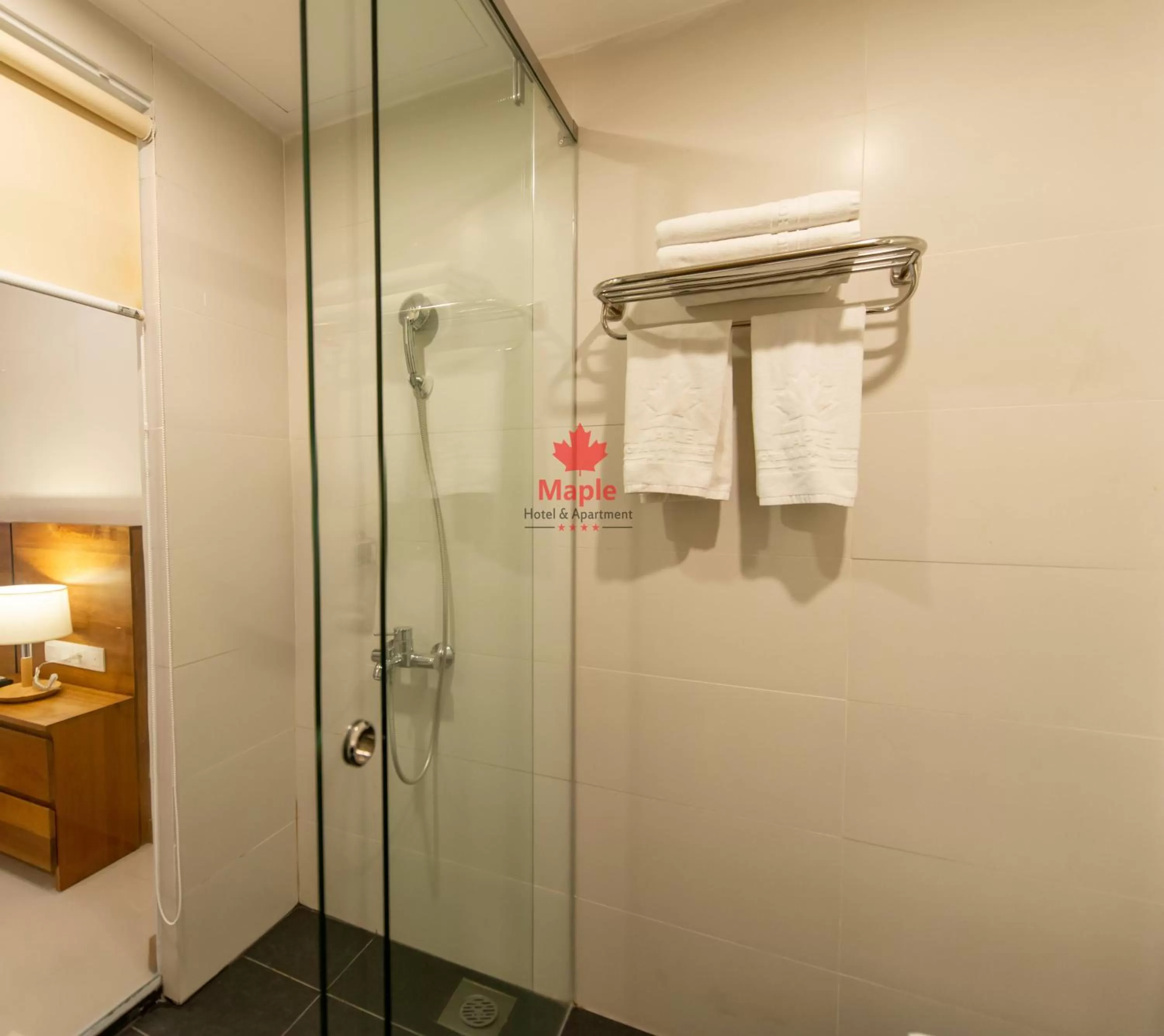 Shower in Maple Hotel & Apartment