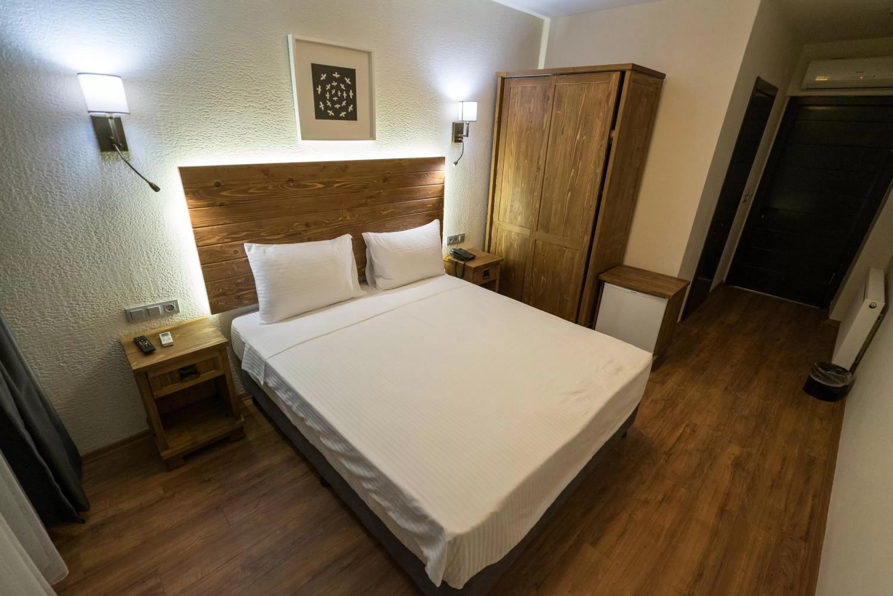 Bed in 8 Rooms Hotel