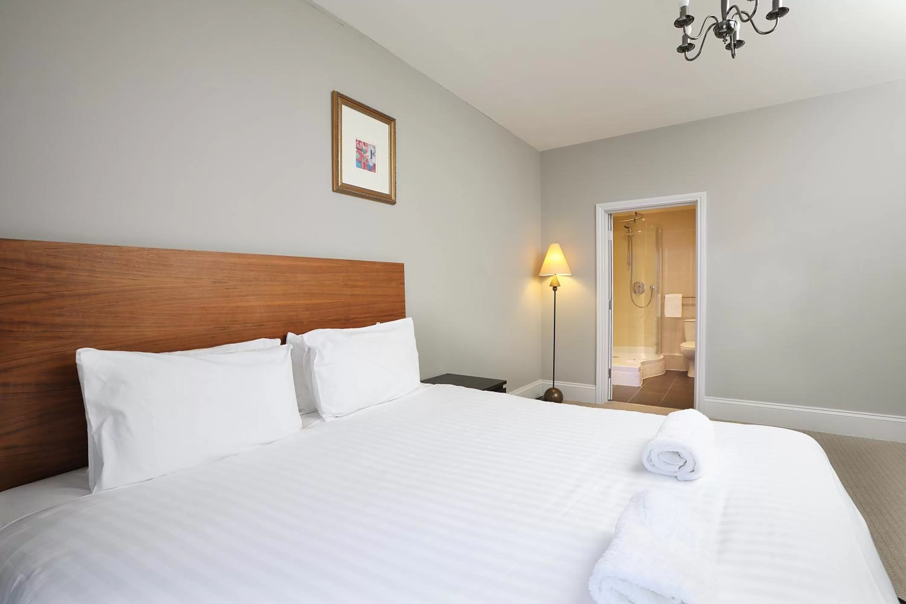 Bed in Cairn Hotel & Apartments