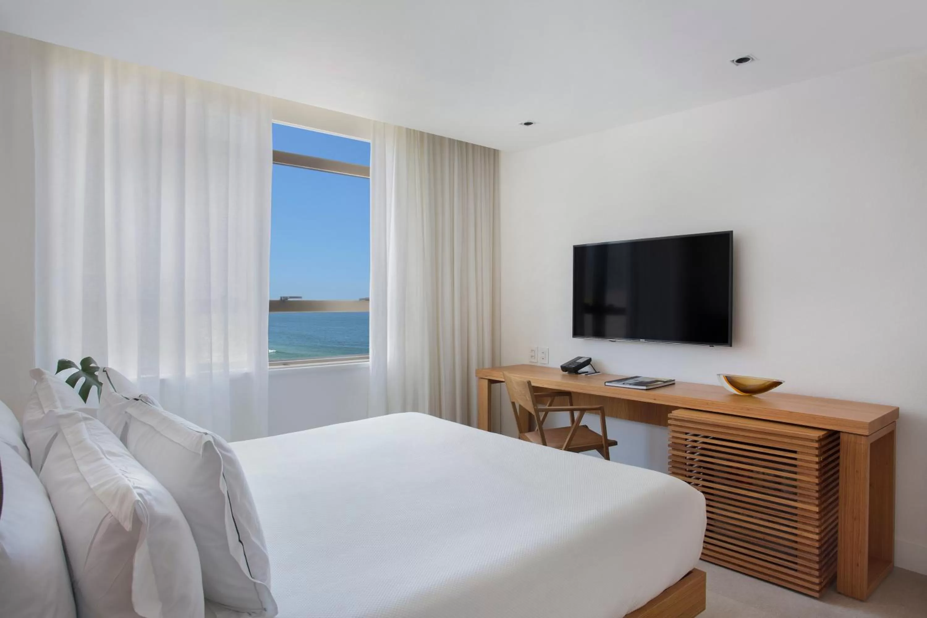 Bed in JANEIRO Hotel