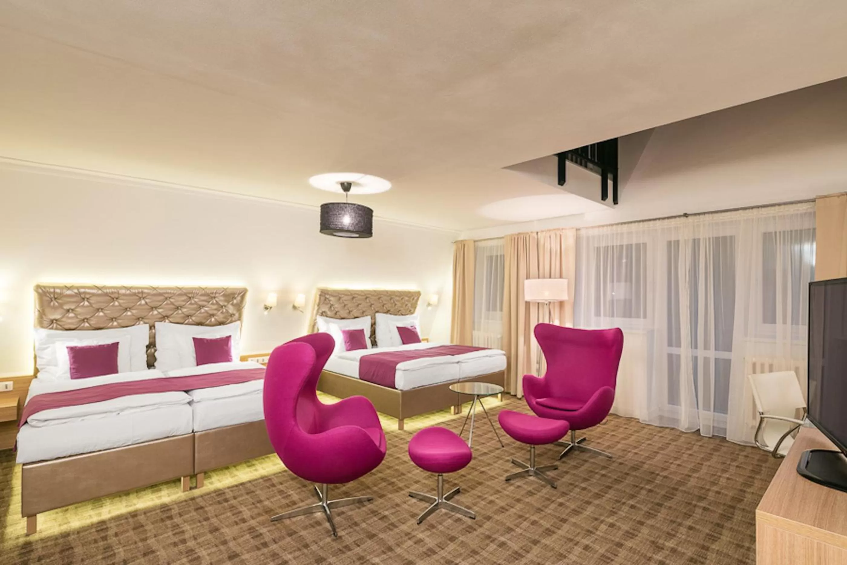 Bed in Pytloun Wellness Hotel Harrachov