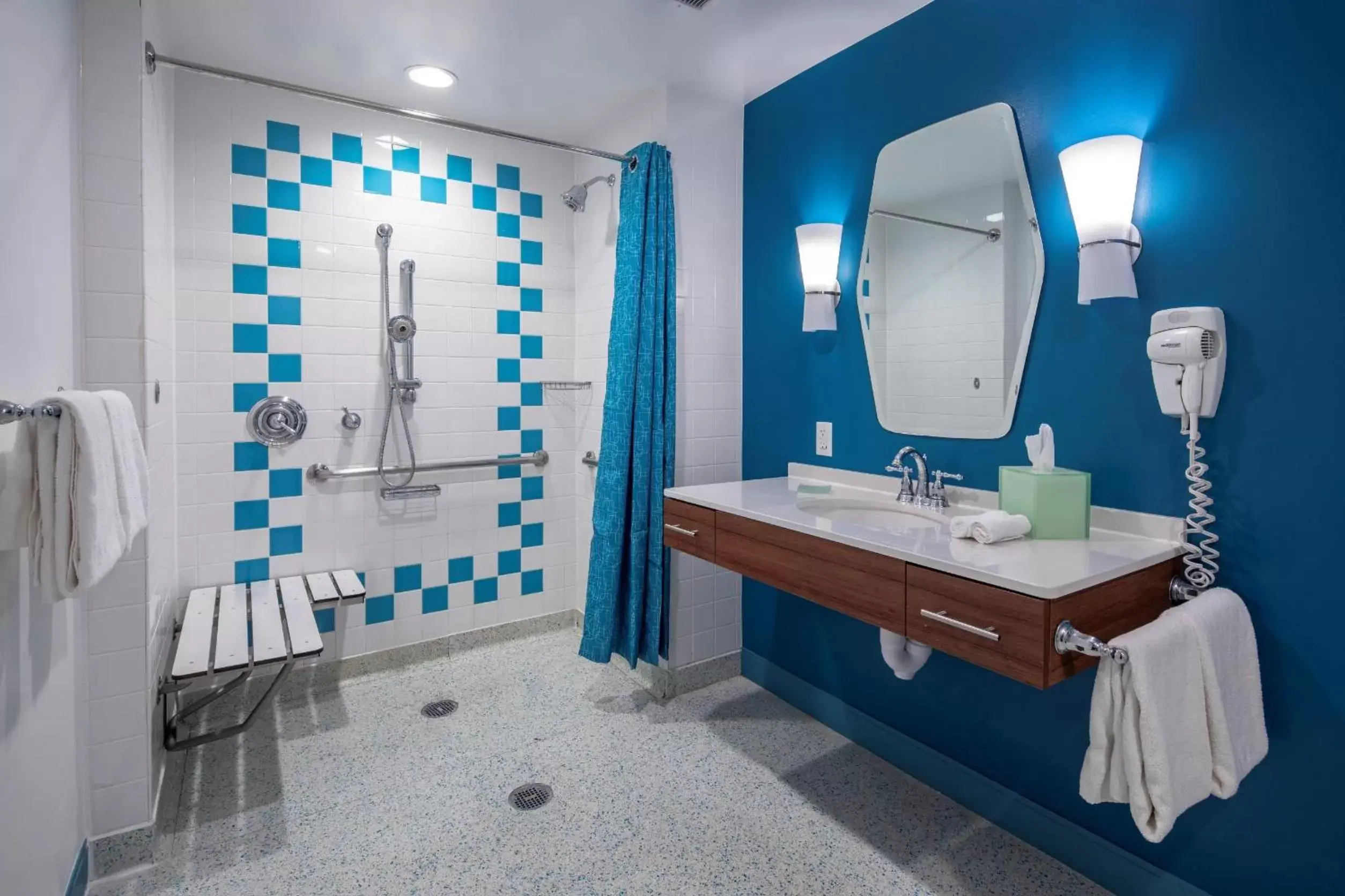 Standard Room with Roll-In Shower Mobility Accessible (Includes Early Park Admission) in Universal's Cabana Bay Beach Resort Standard Room with Roll-In Shower Mobility Accessible (Includes Early Park Admission) in Universal's Cabana Bay Beach Resort