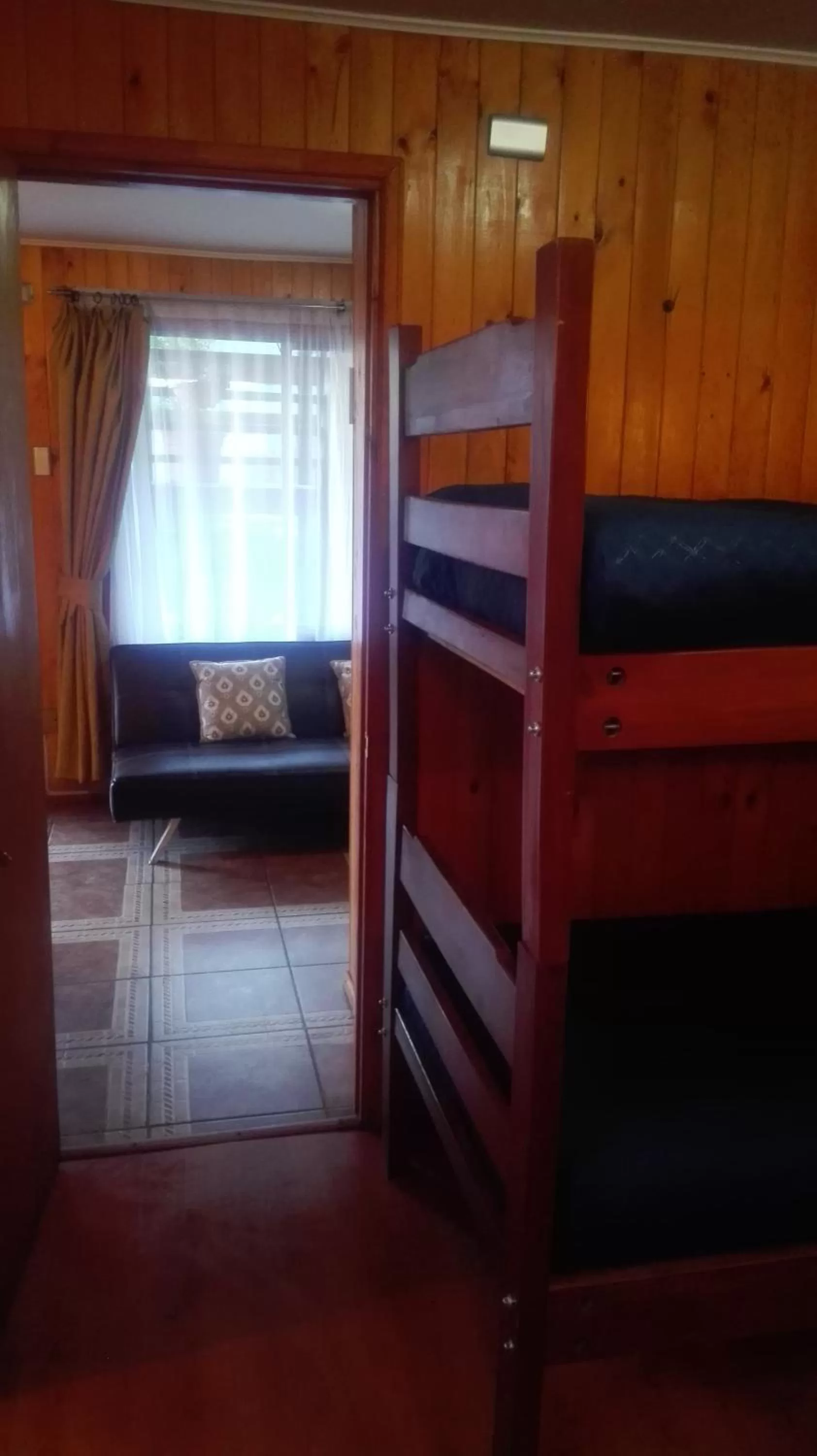 bunk bed, Bed in Apart-Hotel Colonia-Königsberg UBICADO COSTADO TERMINAL BUSES, RÍO CALLE CALLE CARABINEROS DEPARTAMENTOS COMPLETOS CON AIRE ACONDICIONADO Y ESTACIONAMIENTO