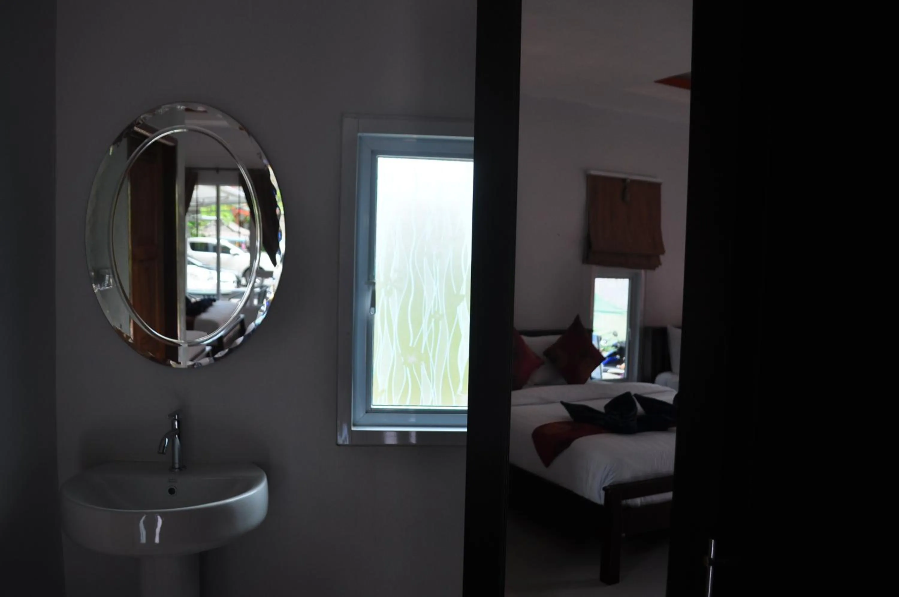 Bed in Tamarind Twin Resort