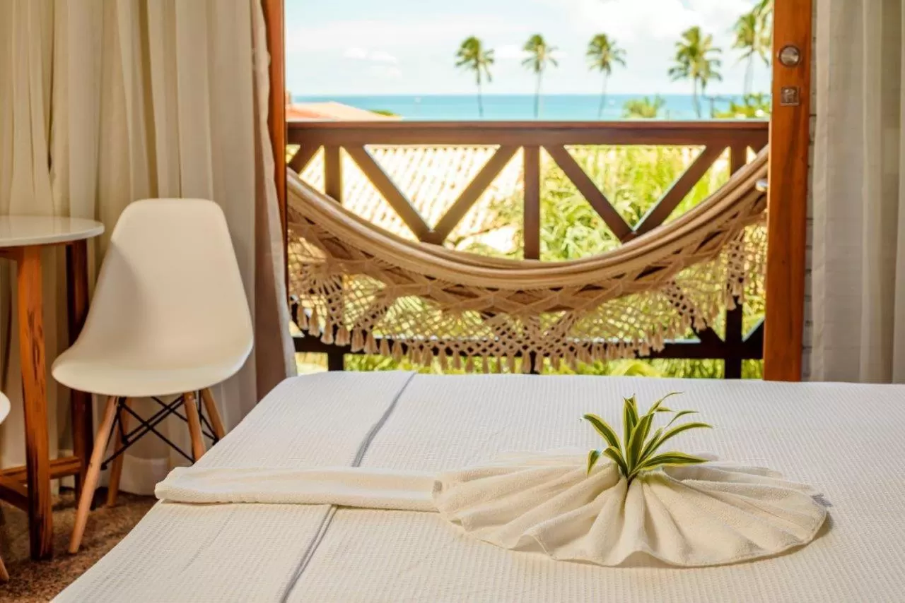 Bed in Hotel Vento Brasil