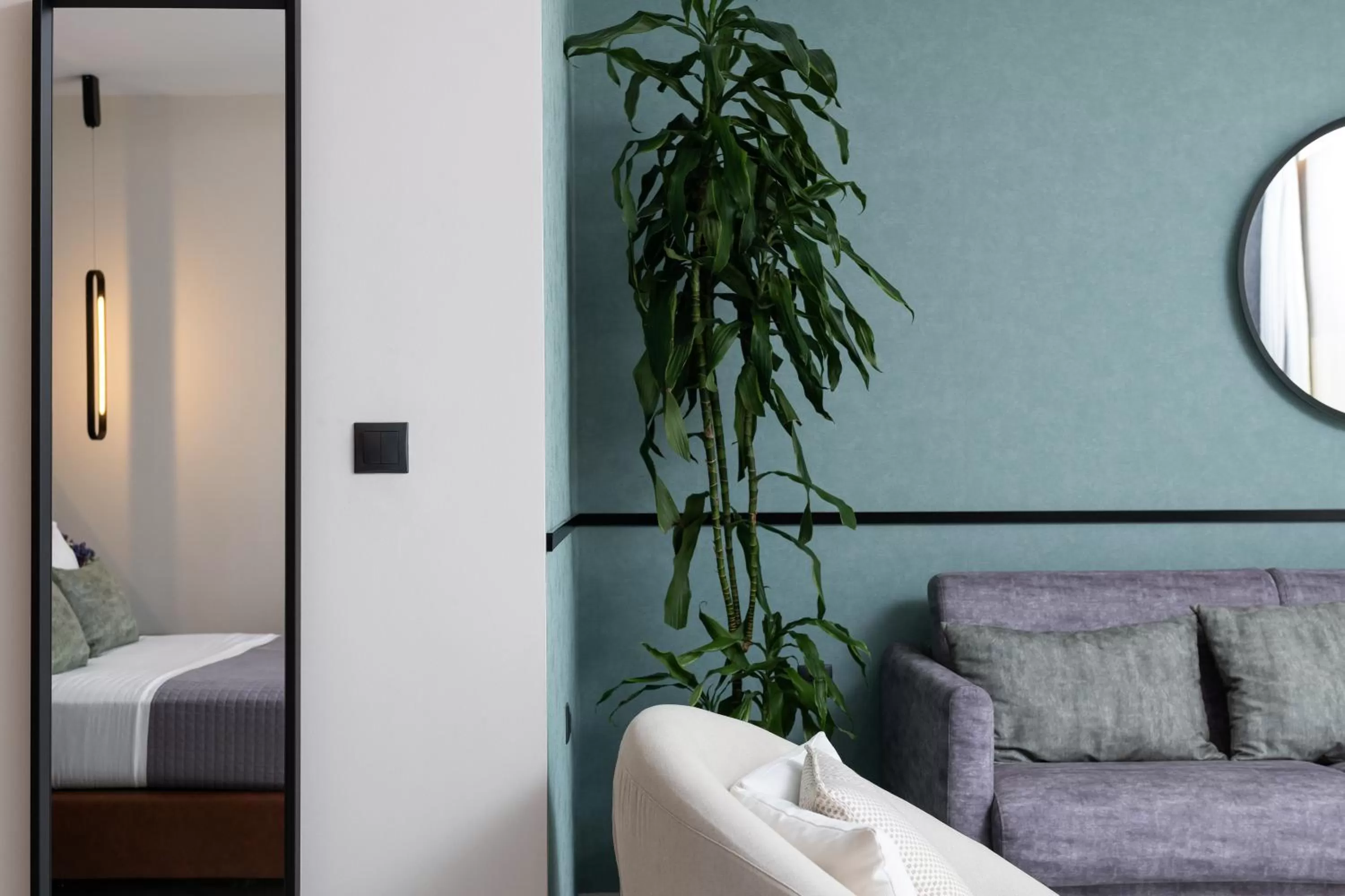 Living room, Bed in Enattica Suites