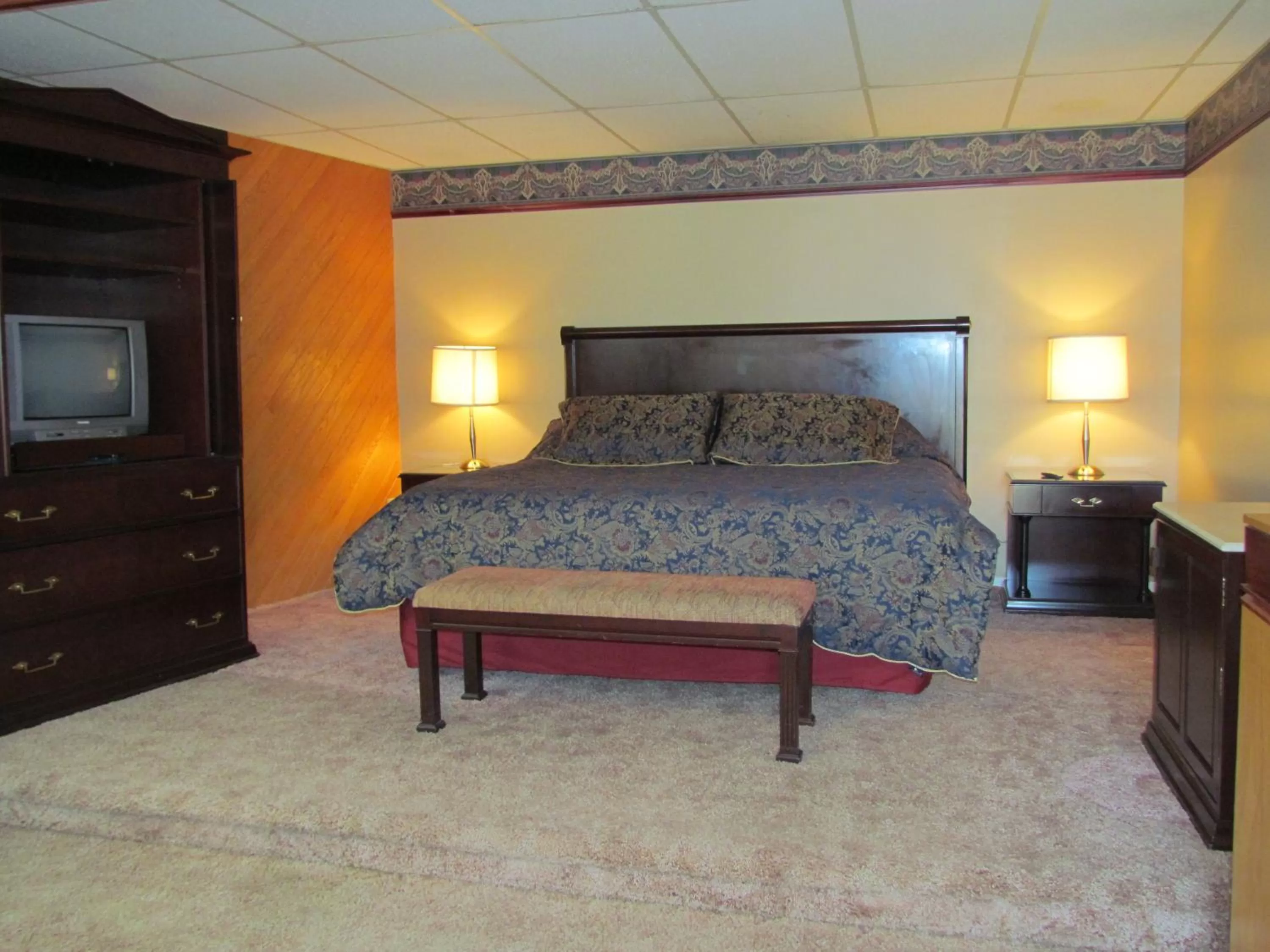 Bed in Hotellerie Jardins de Ville