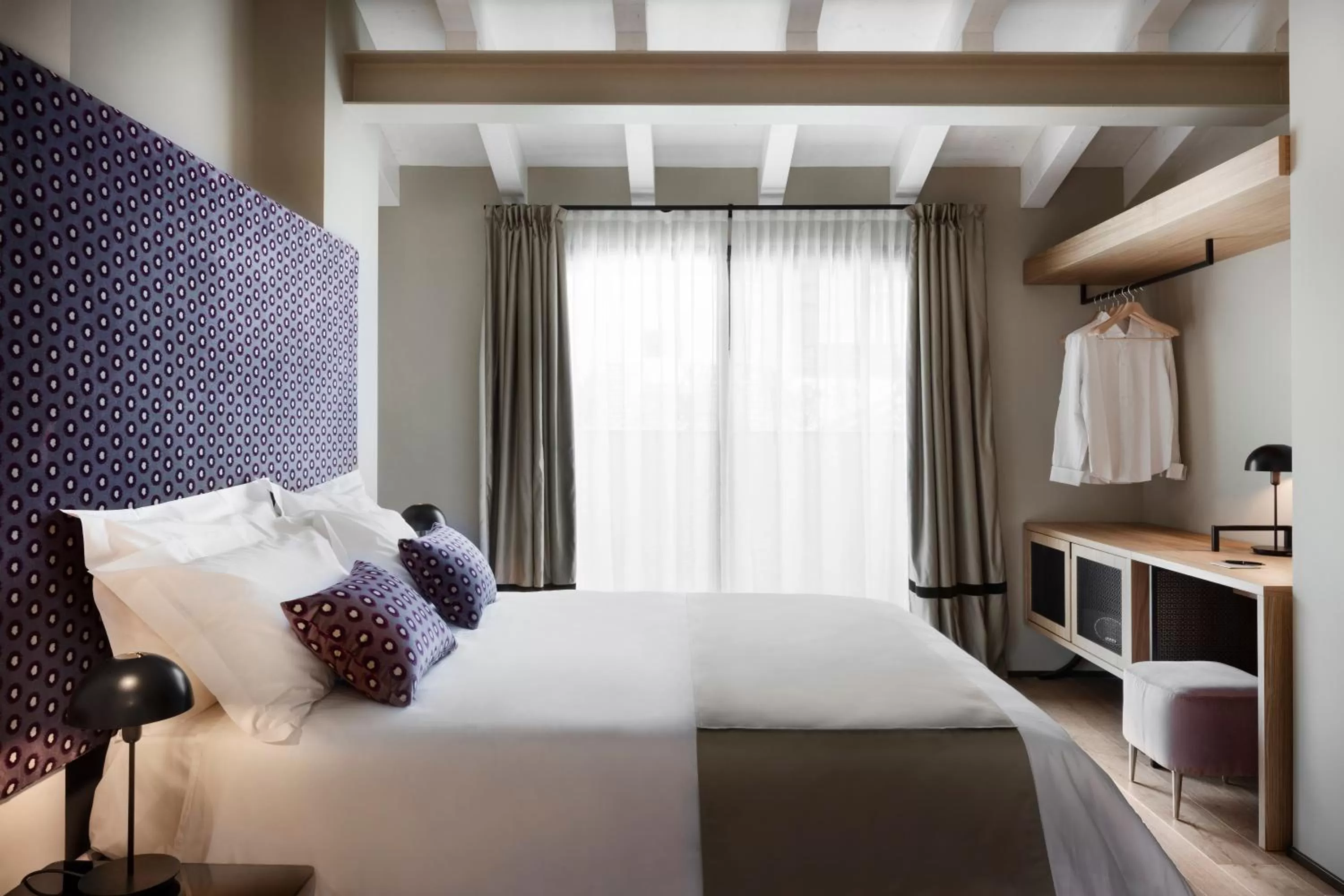 Bed in Speronari Suites