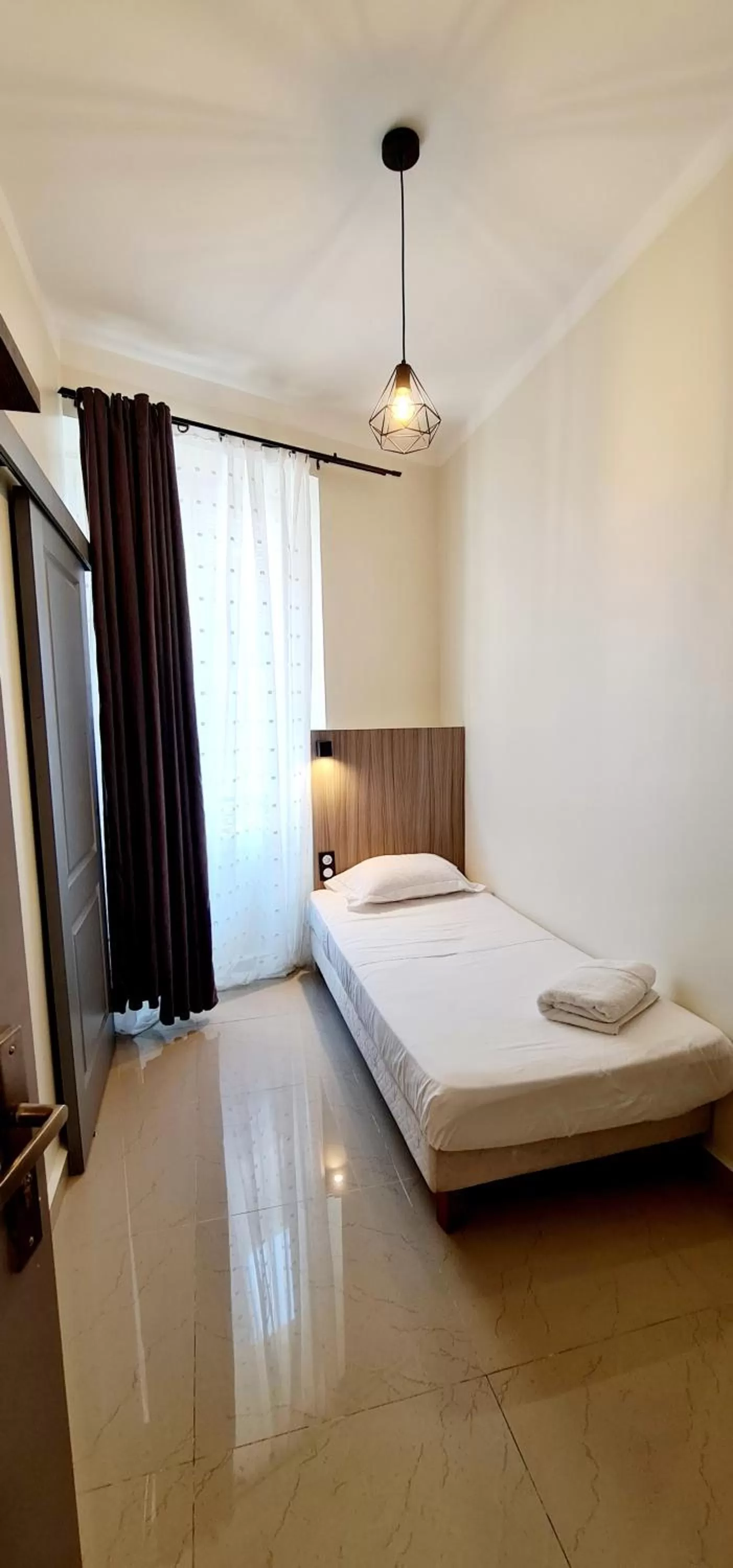 Photo of the whole room, Bed in ESPERANCE HOTEL