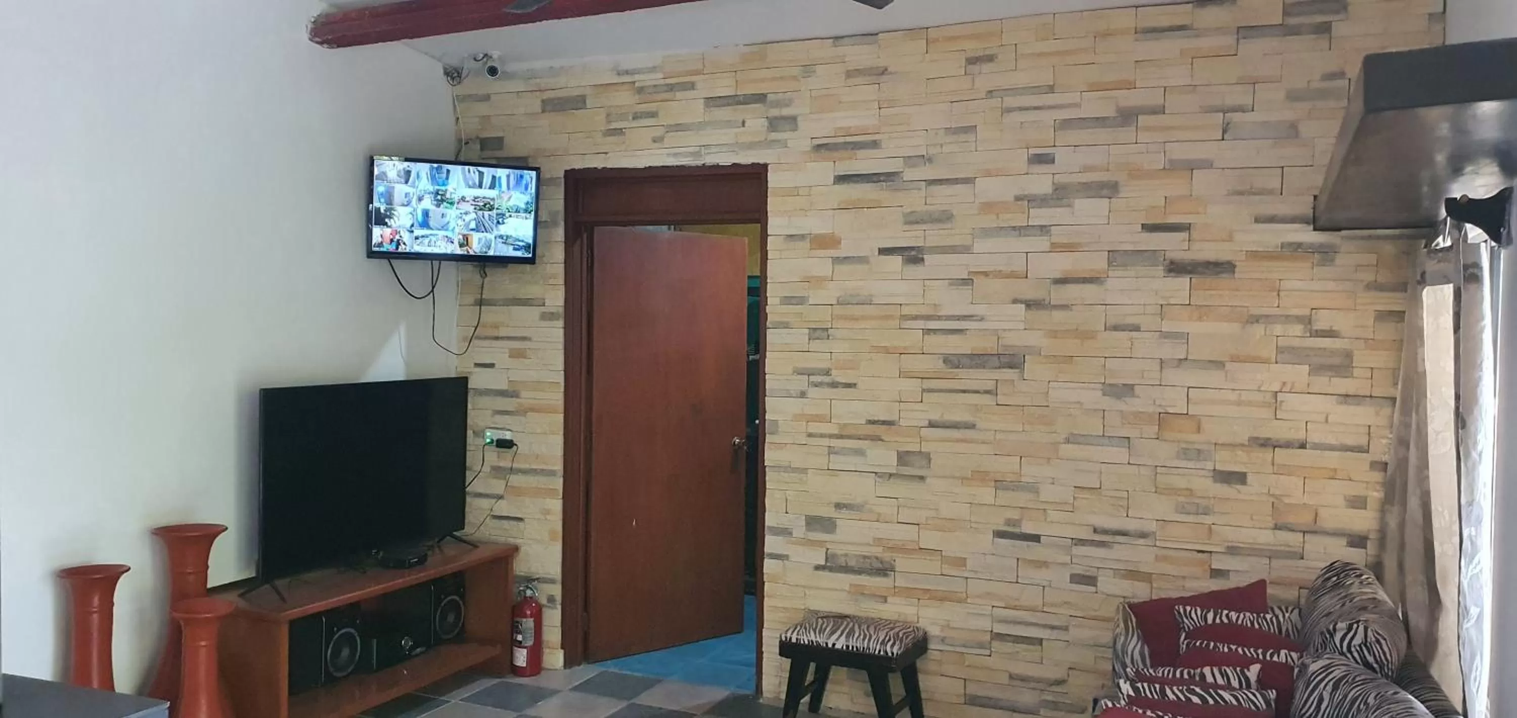 Communal lounge/ TV room in Hotel posada MARCAS