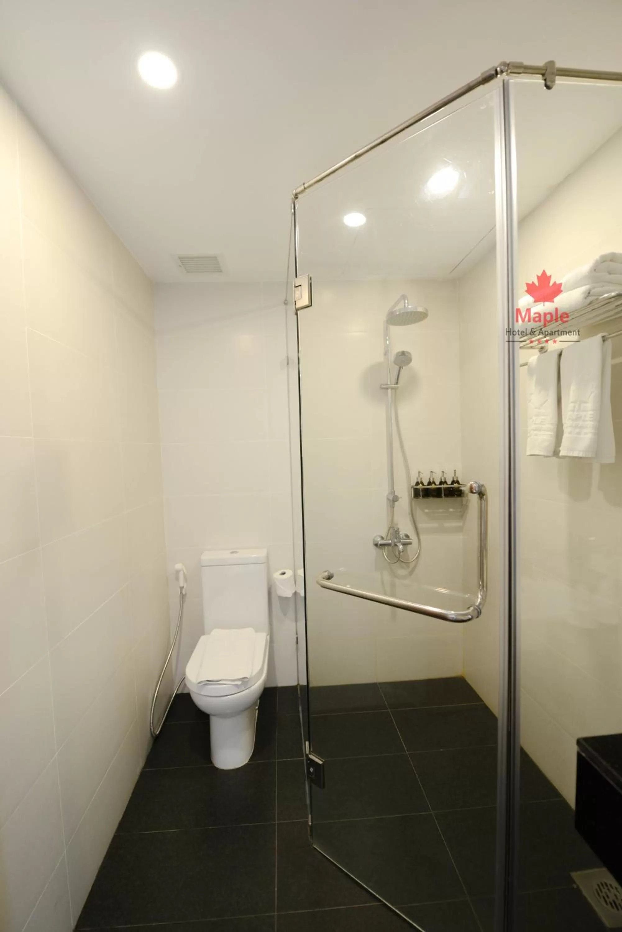 Shower in Maple Hotel & Apartment