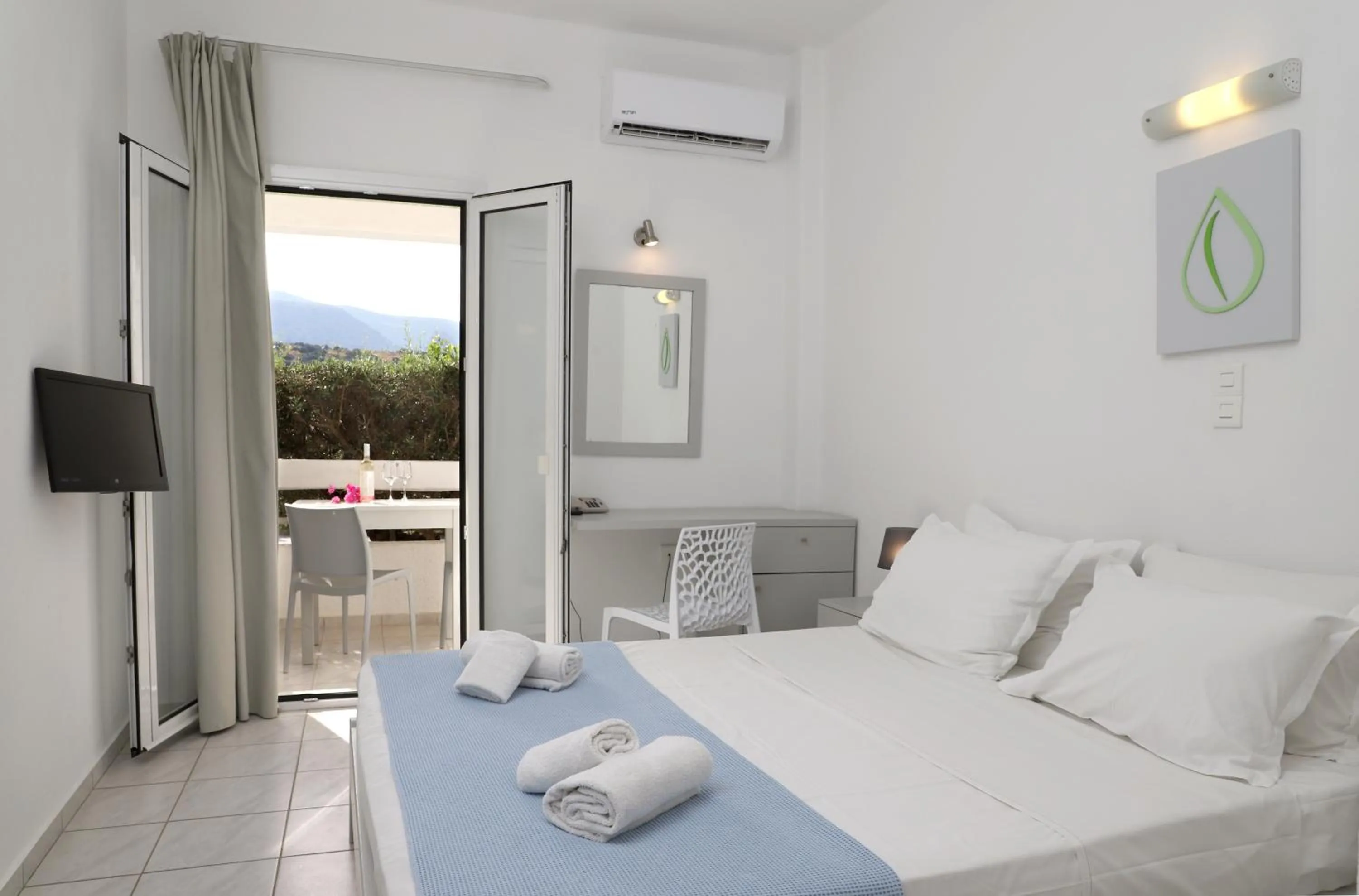 Bed in Elounda Krini Hotel