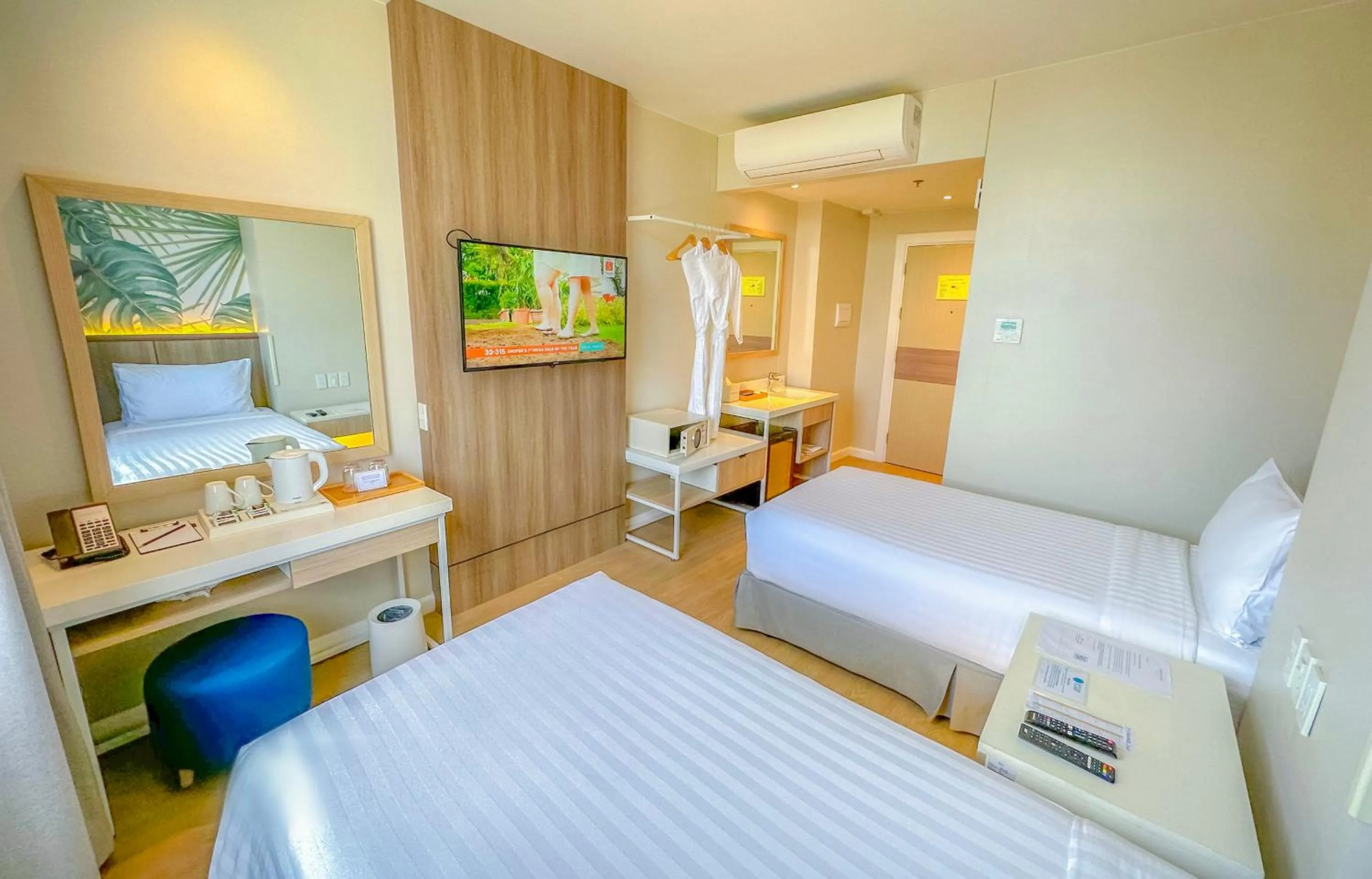 Bed in Harolds Hotel Quezon City