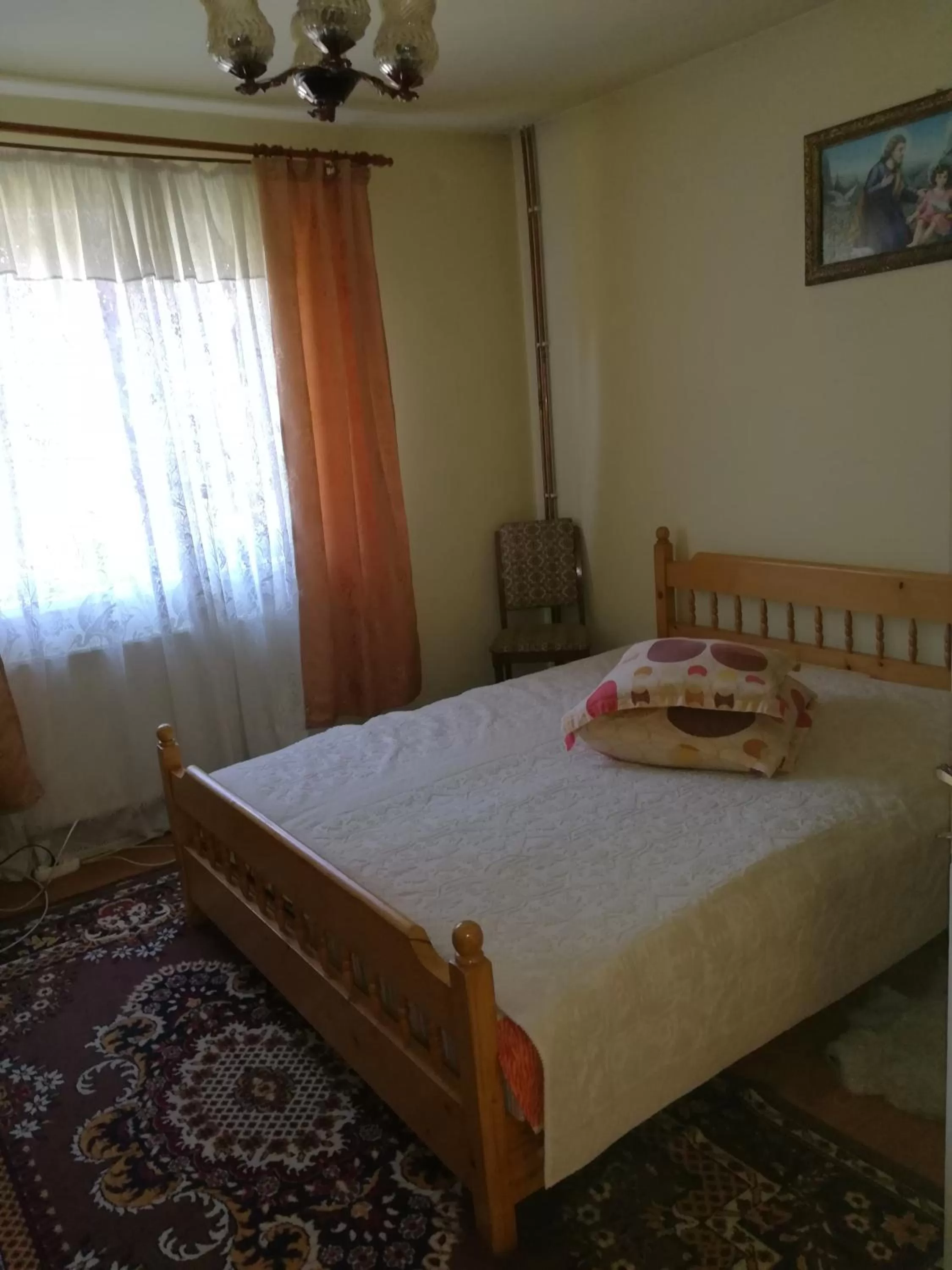 Photo of the whole room, Bed in Pensiunea Luminita