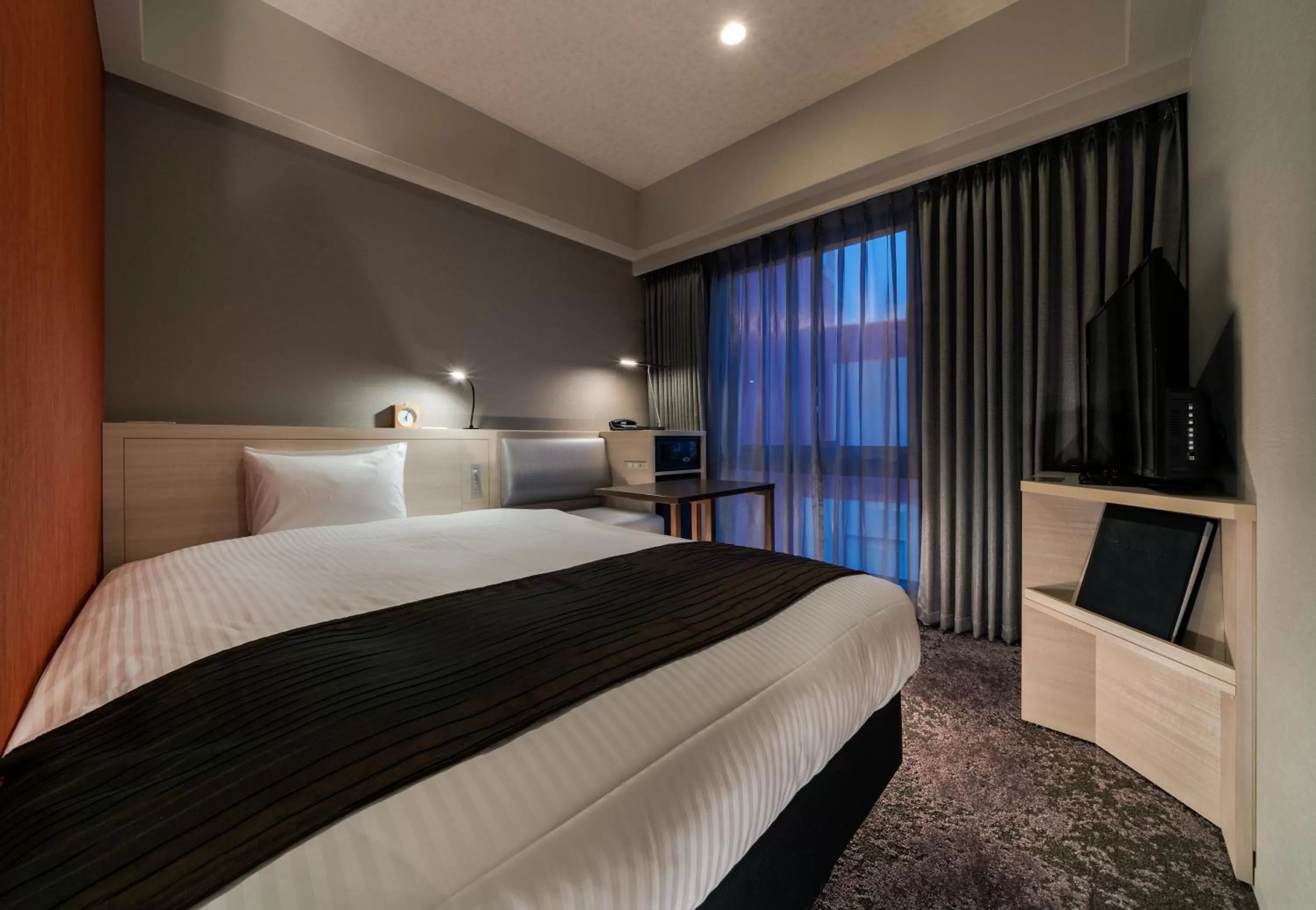 Photo of the whole room, Bed in DEL style Fukuoka Nishinakasu by Daiwa Roynet Hotel