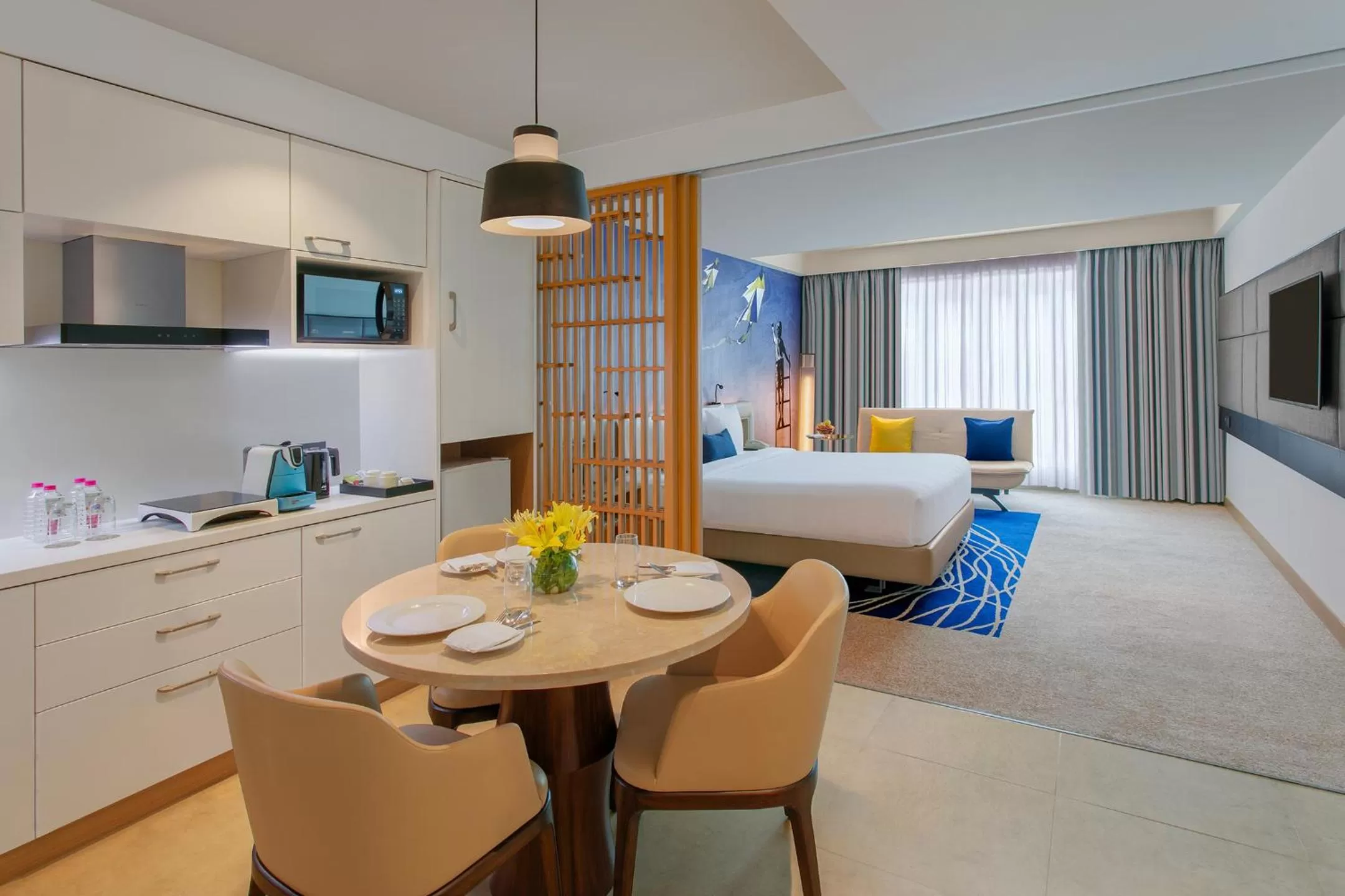 Seating area, Bed in Novotel Ahmedabad