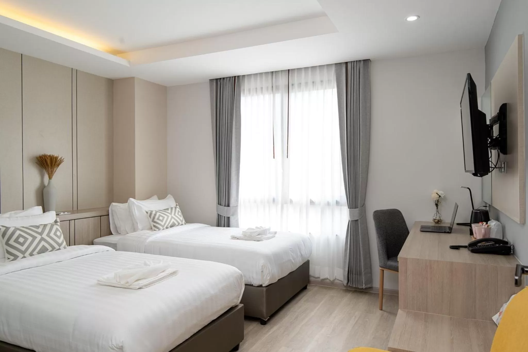 Bed in The Riski Hotel at Bangphlat Station SHA