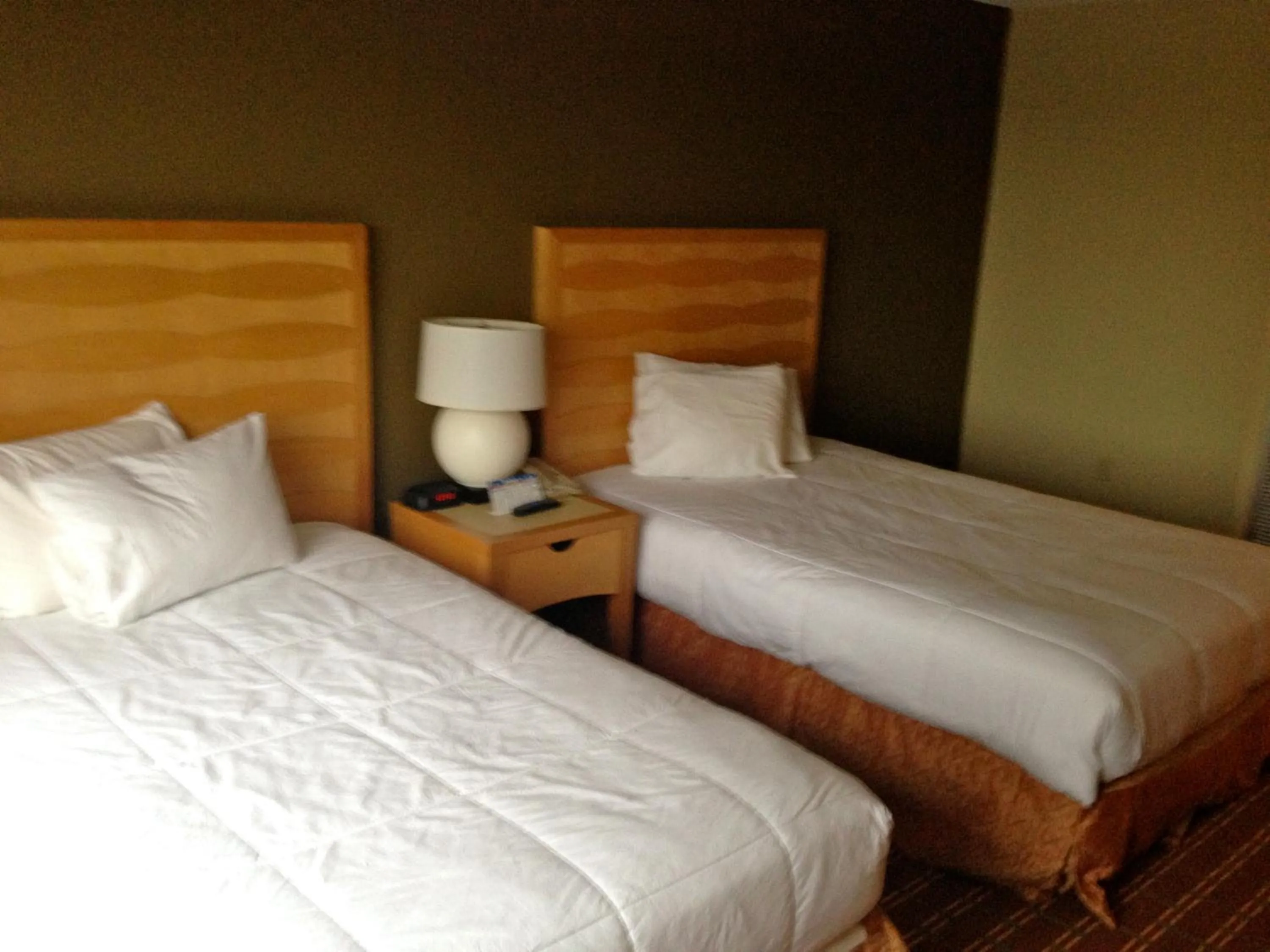 Bed in The Avalon Hotel and Conference Center