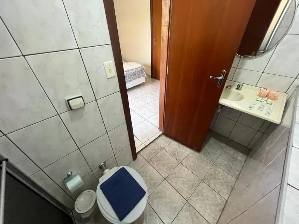 Triple Room with Private Bathroom in Travessa 12 - Suítes centro de Serra Negra - SP