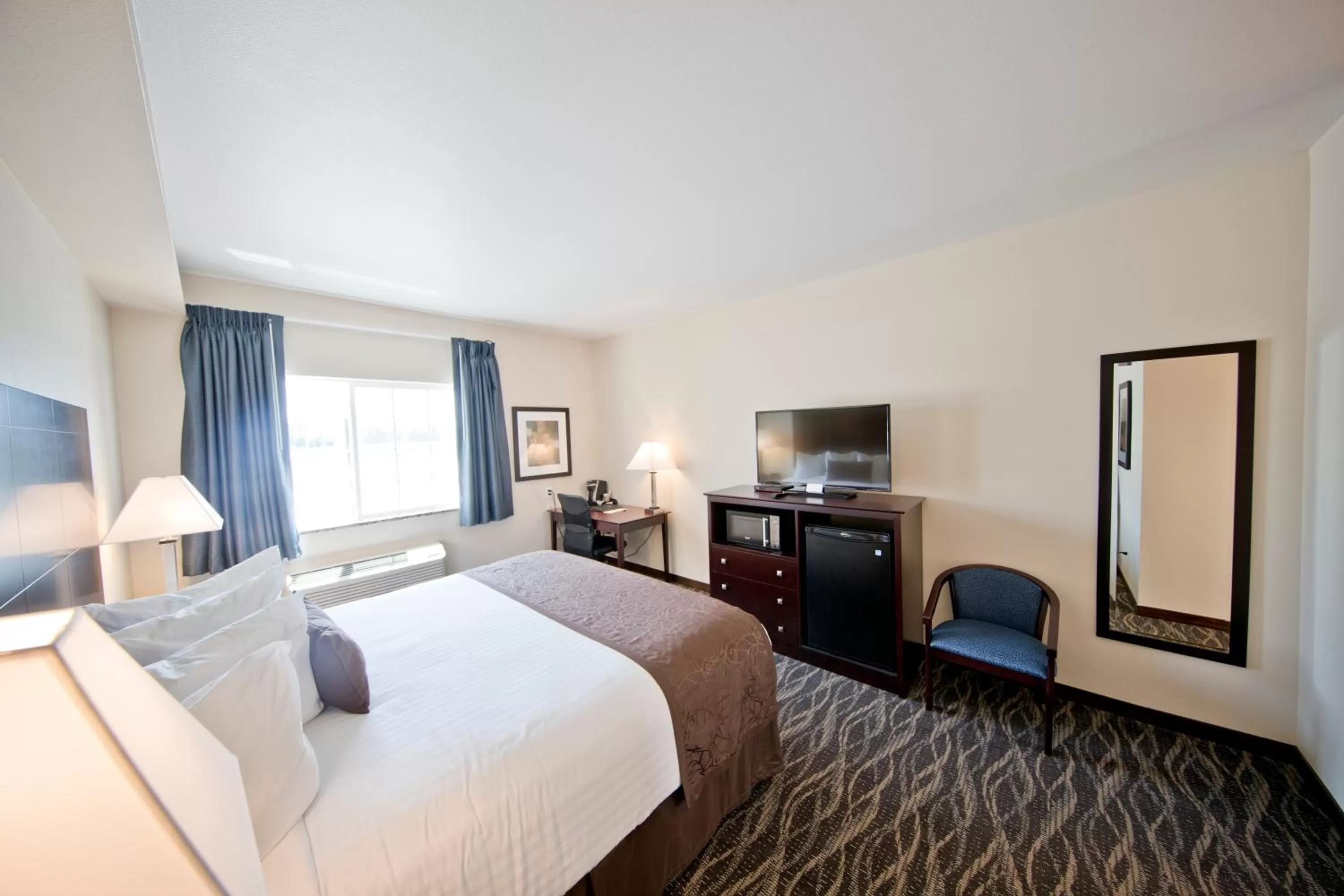 Bedroom, Bed in Cobblestone Inn & Suites -Clarinda