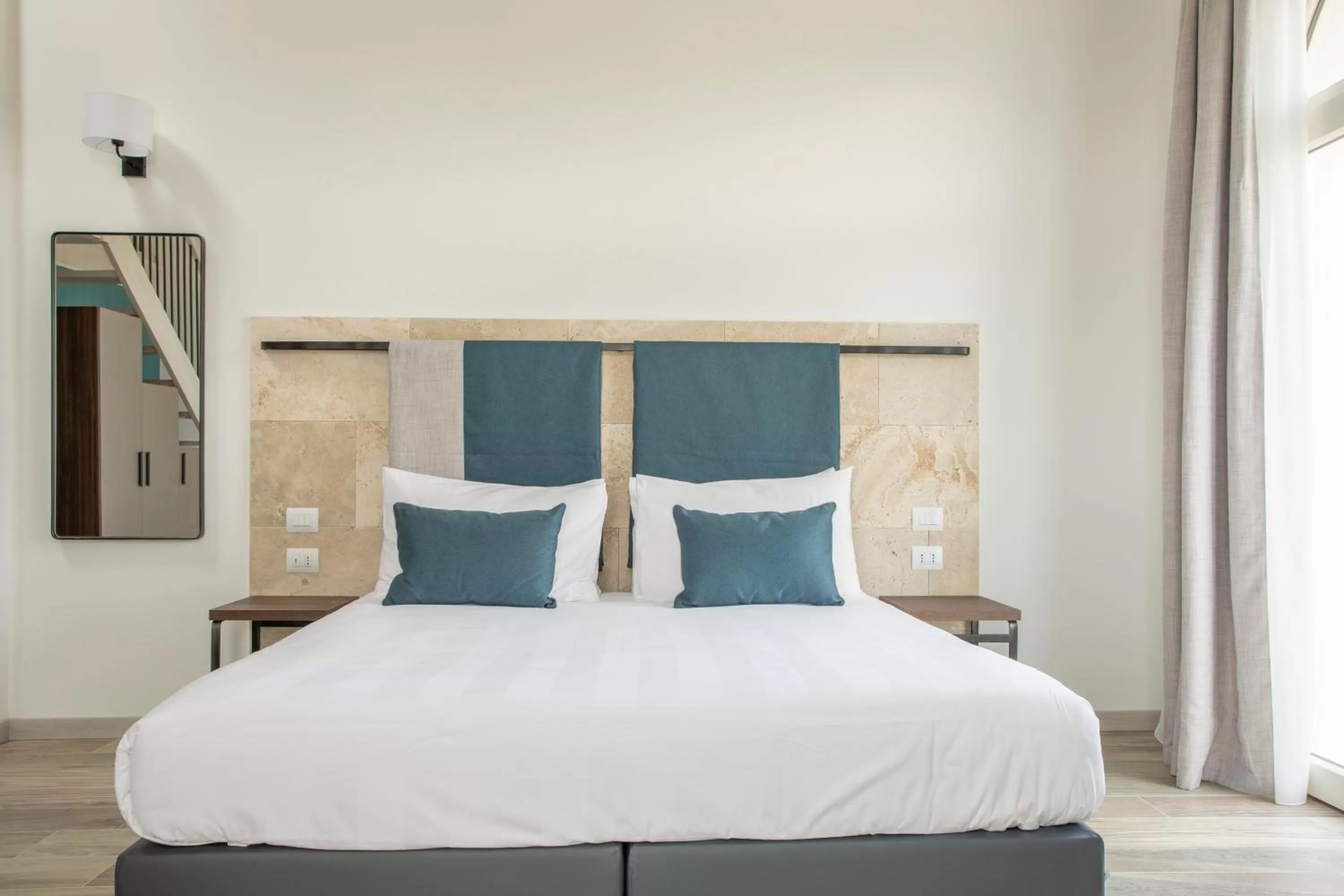 Bed in Riva Toscana Golf Resort & SPA