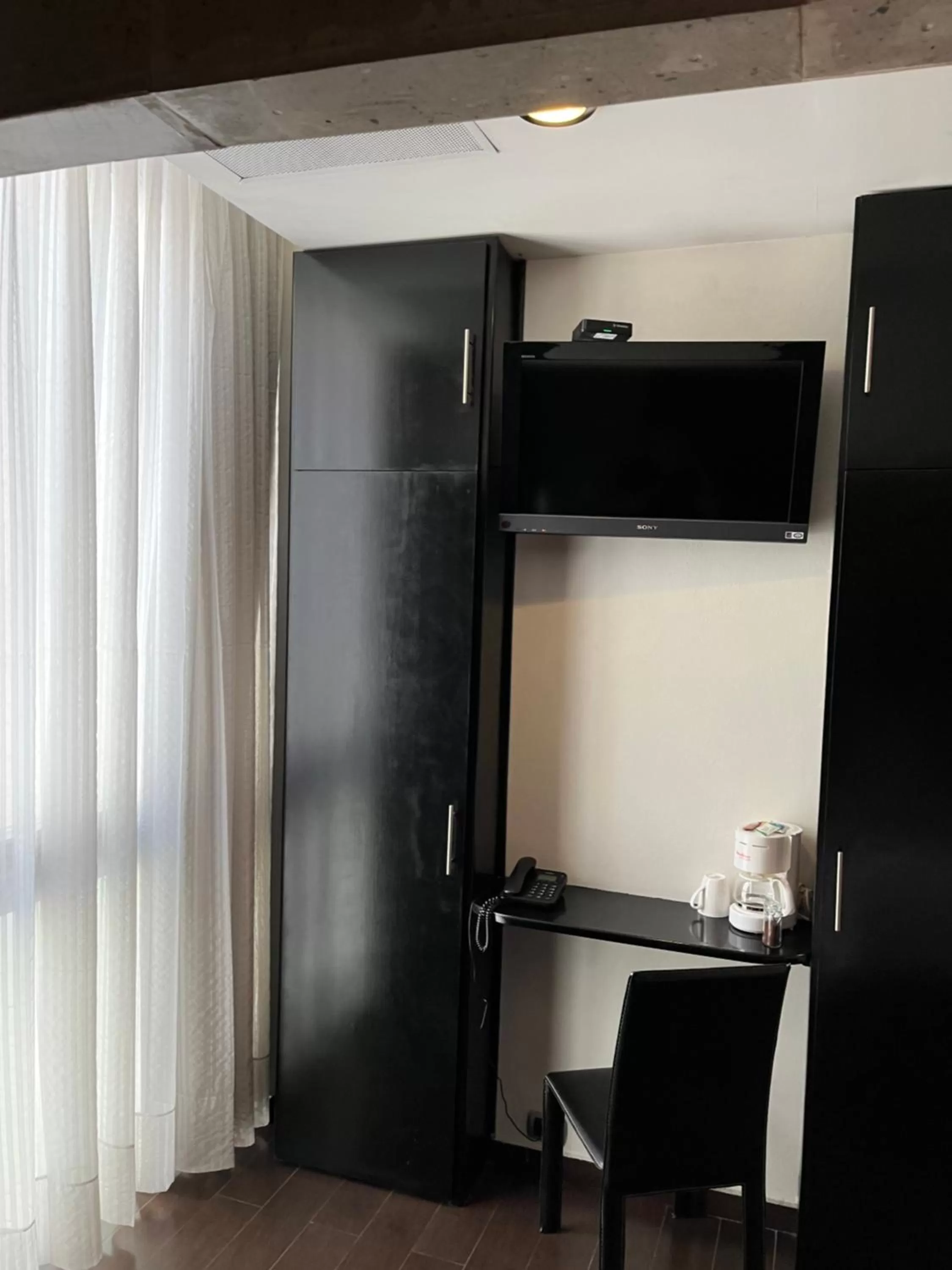 Kitchen or kitchenette in Zújmú Business Boutique Hotel