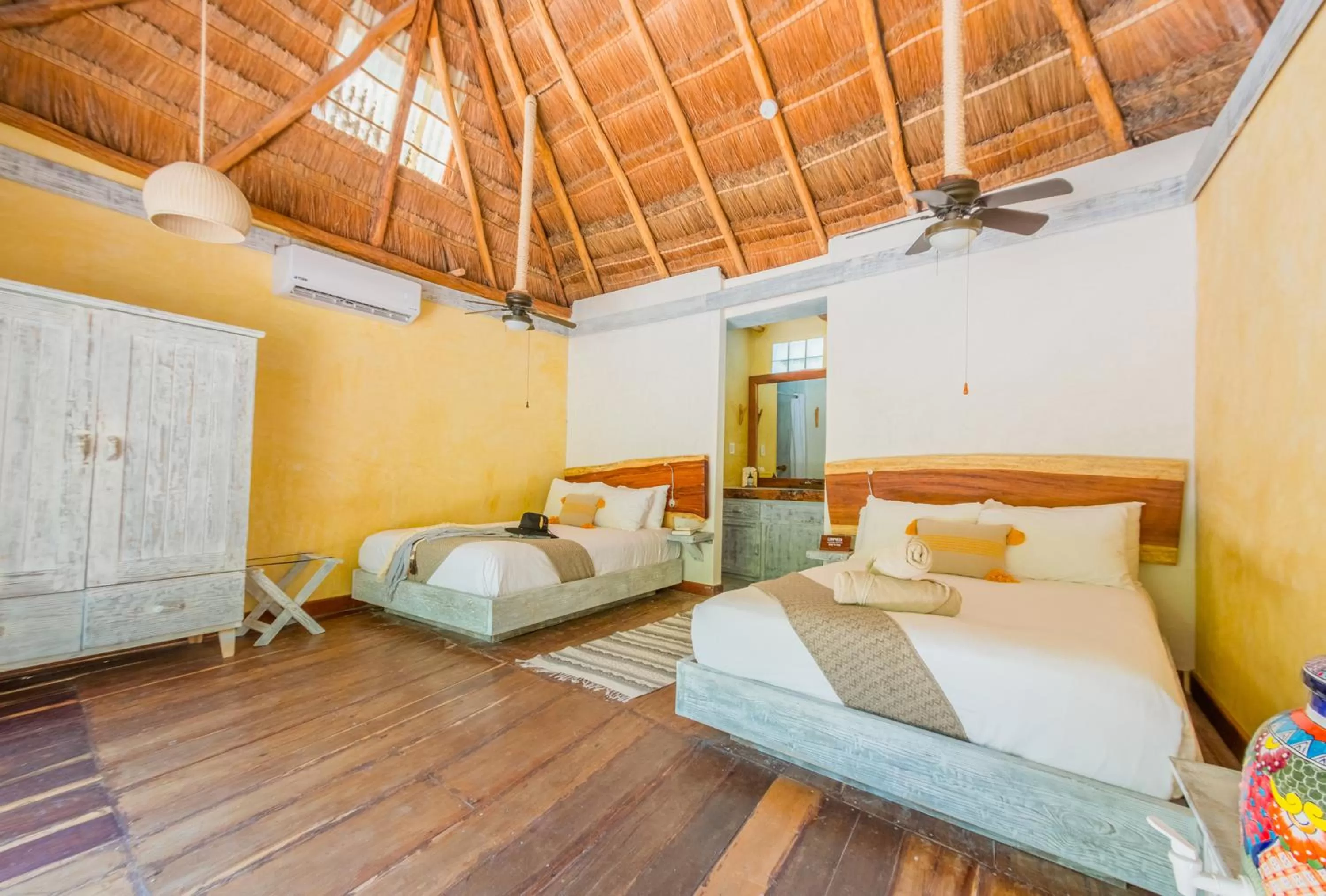 Bedroom, Bed in Villa Pescadores Tulum-Beachfront hotel by Ahau Collection