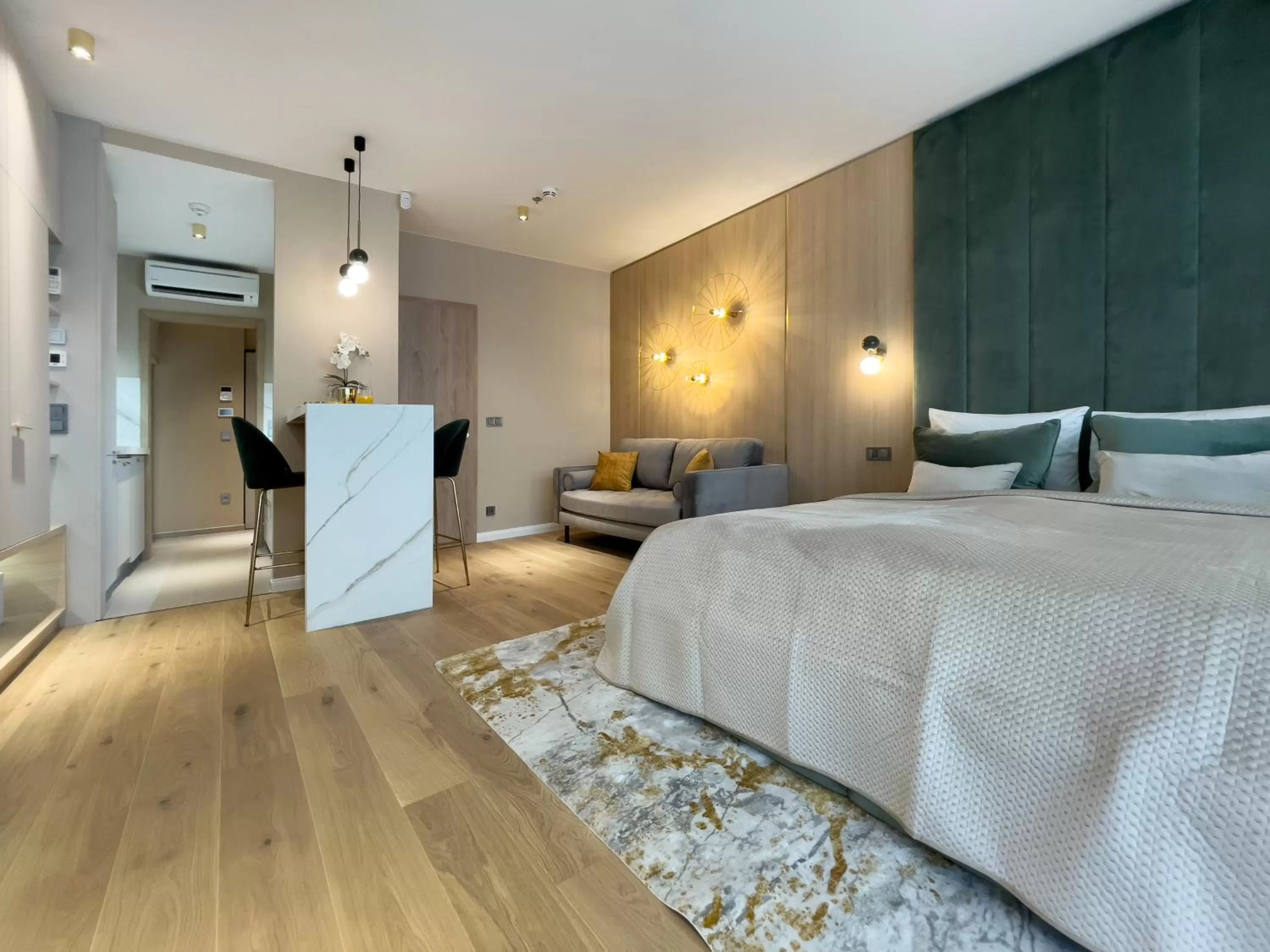 Photo of the whole room, Bed in Emerald Downtown Luxury Suites by Continental Group