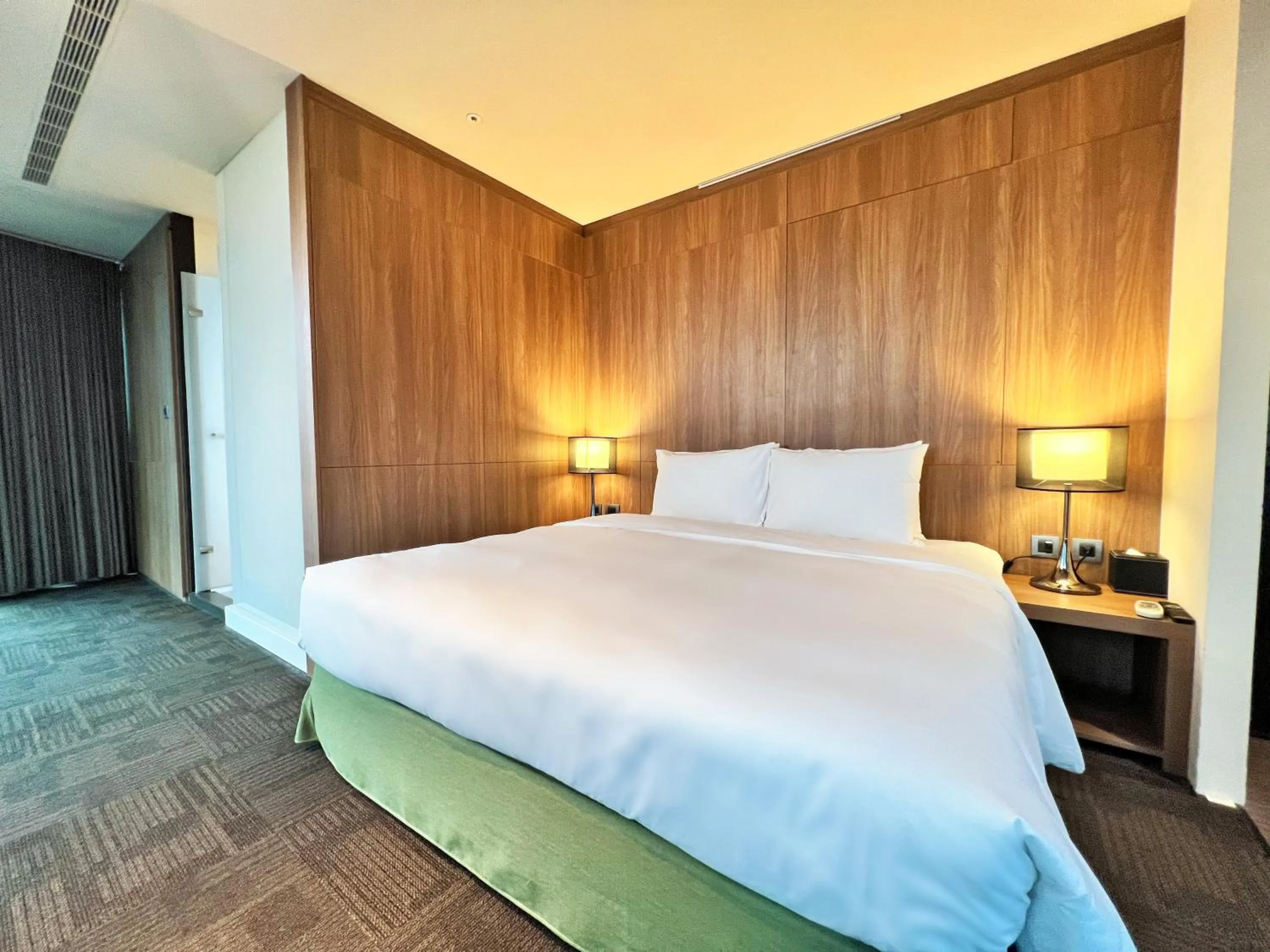 Bedroom in Wallsun Hotel