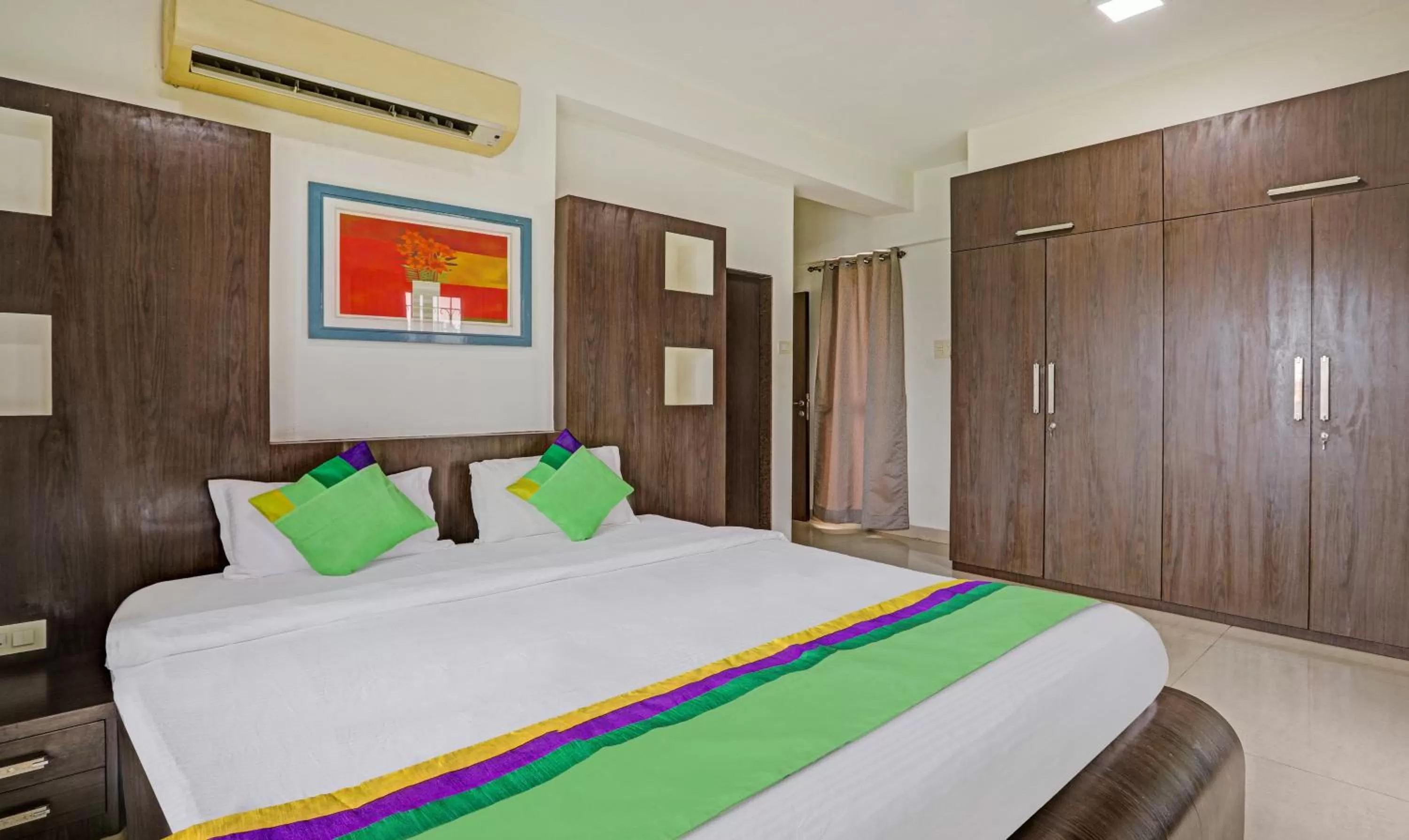 Bed in Treebo Trend Welcome Apartments