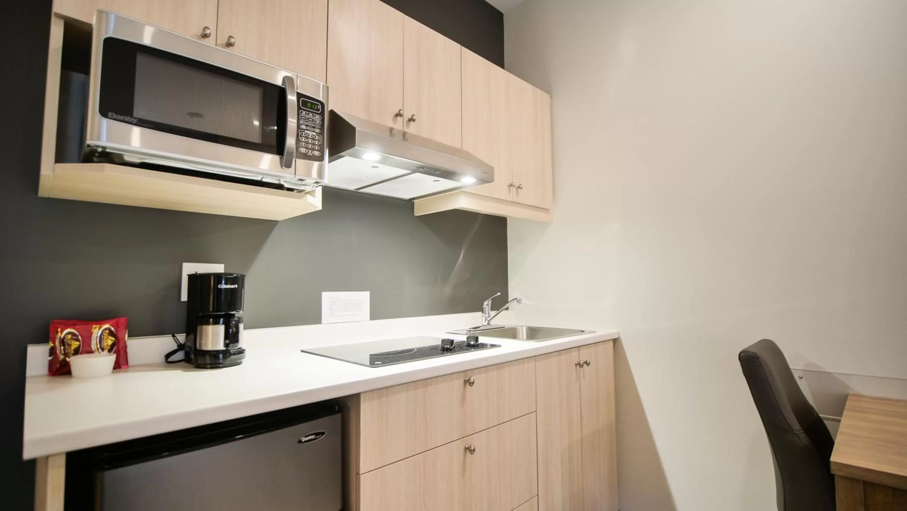 Kitchen/Kitchenette in Motel L'Abri