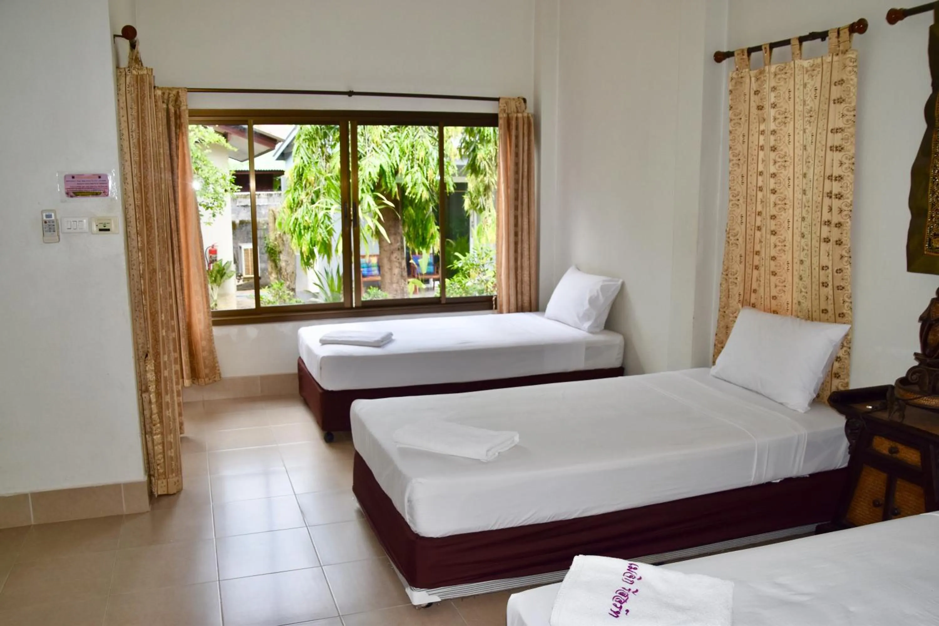 Photo of the whole room, Bed in Magic Resort