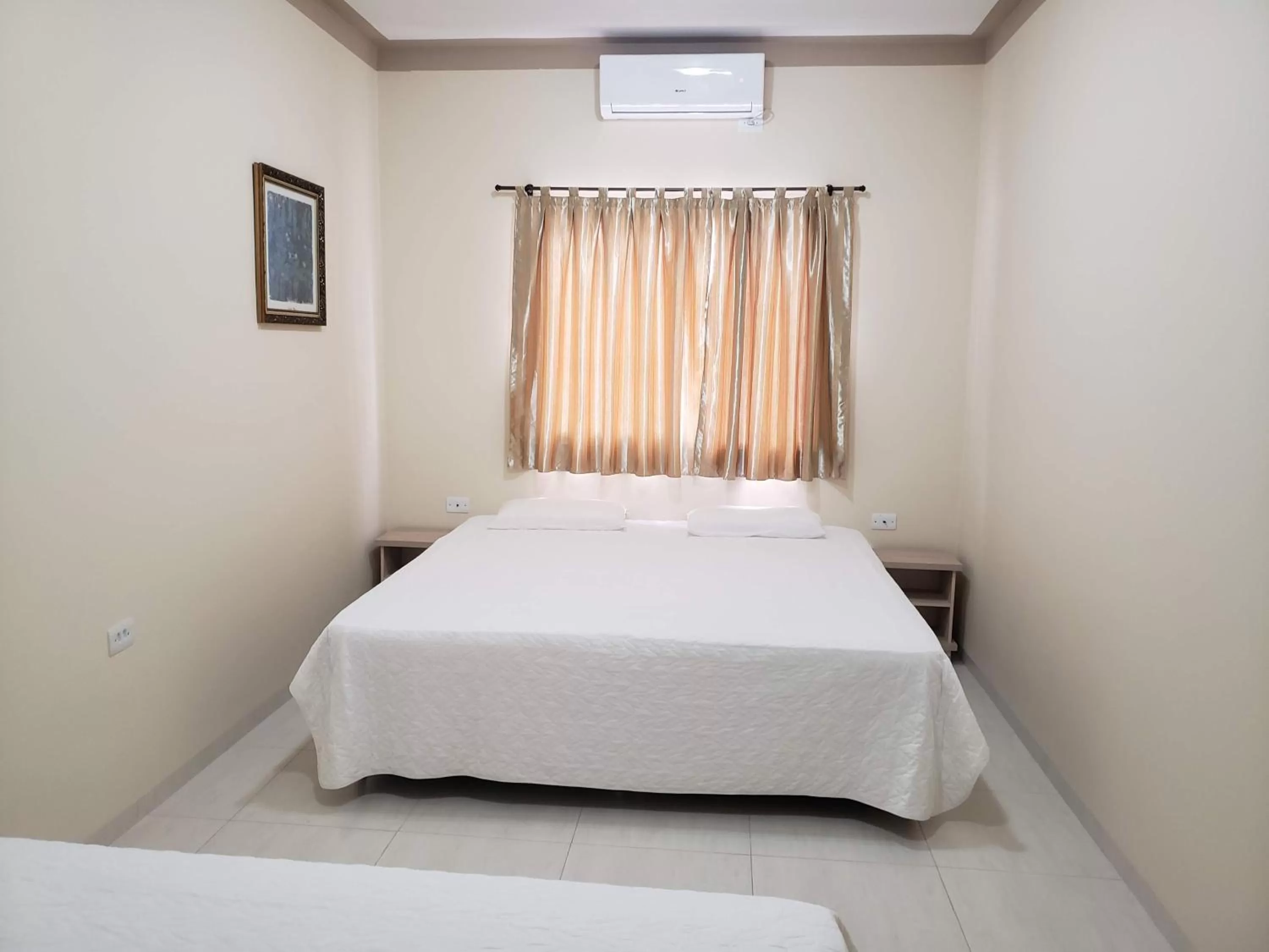 Bed in Felipe Family Houses - Casas de temporada