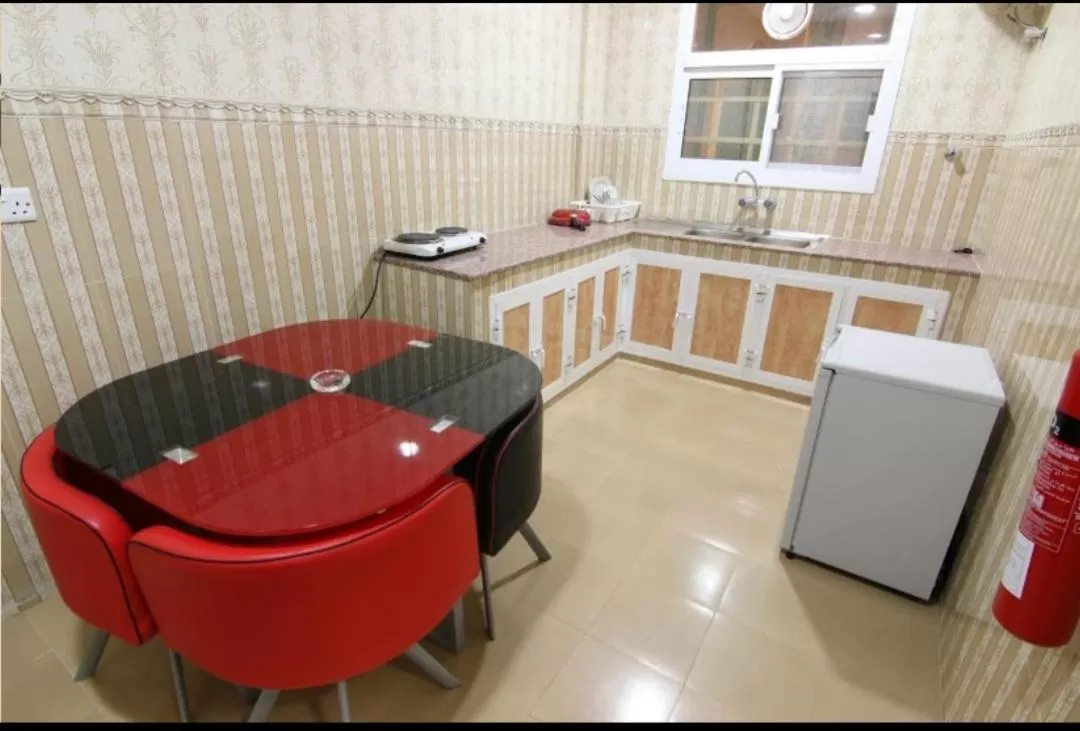 Kitchen or kitchenette in DREAMLAND HOTEL APARTMENT NIZWA