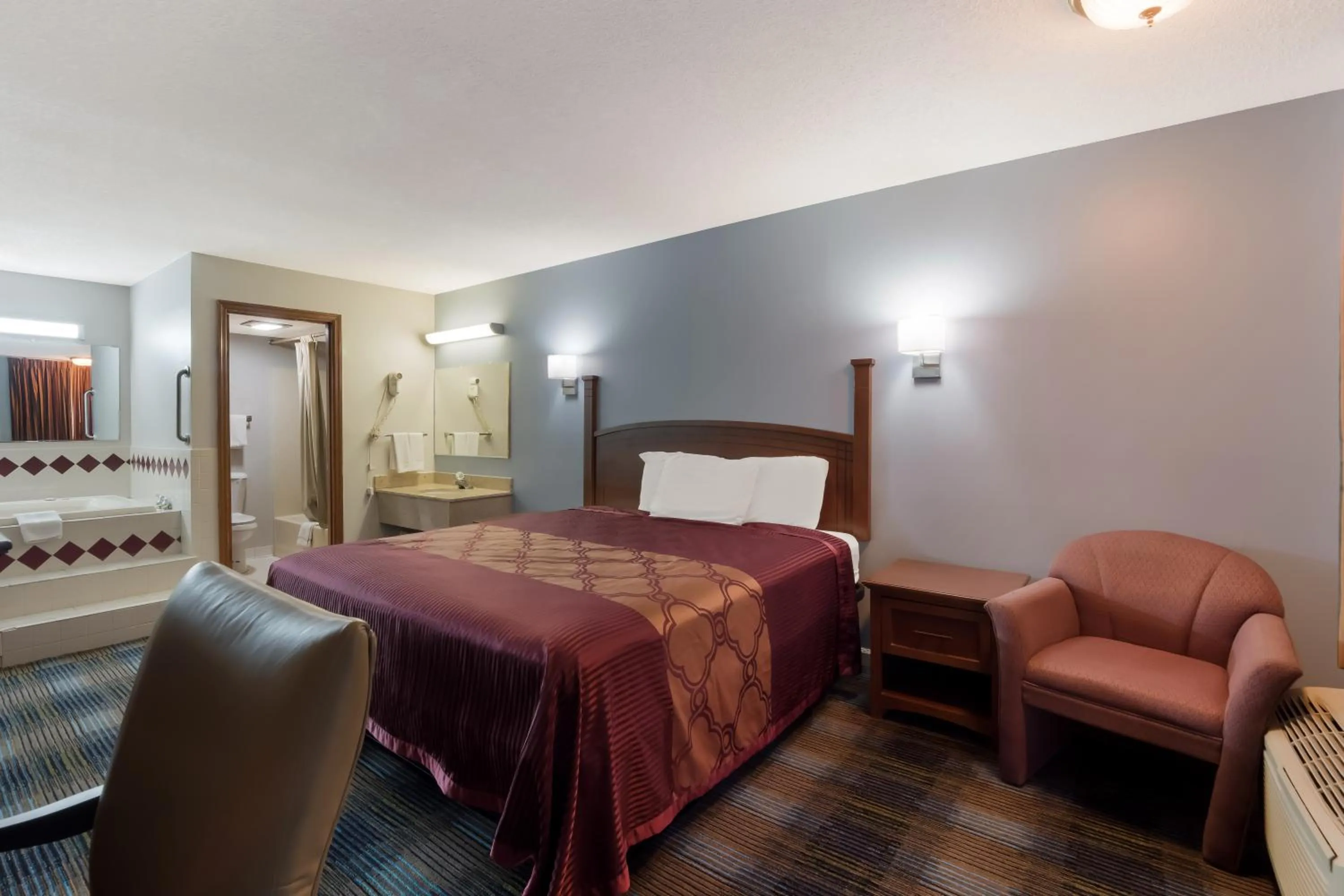 Bed in Rodeway Inn Augusta West - Fort Gordon