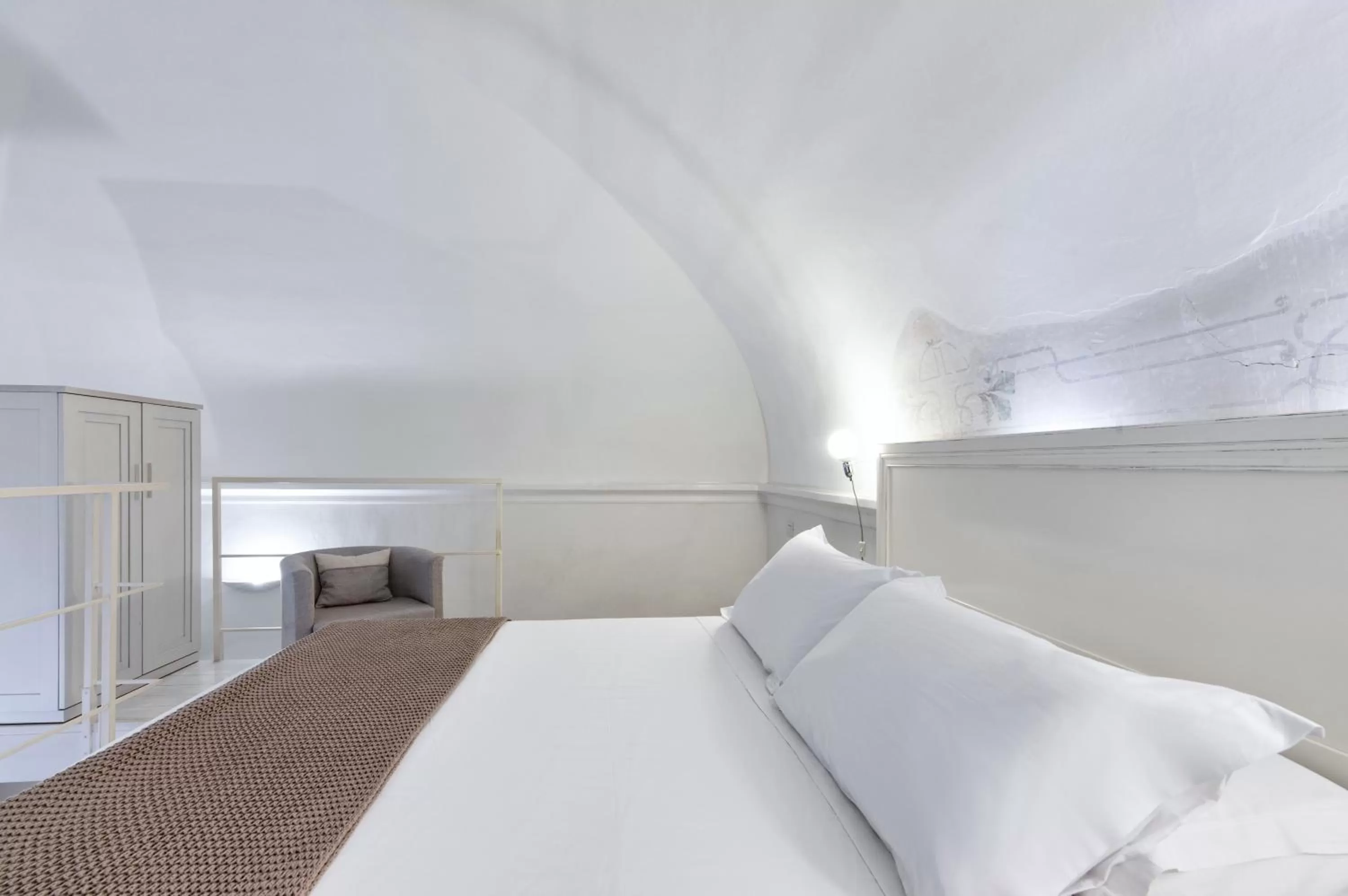 Bed in Casa di Lo Suites